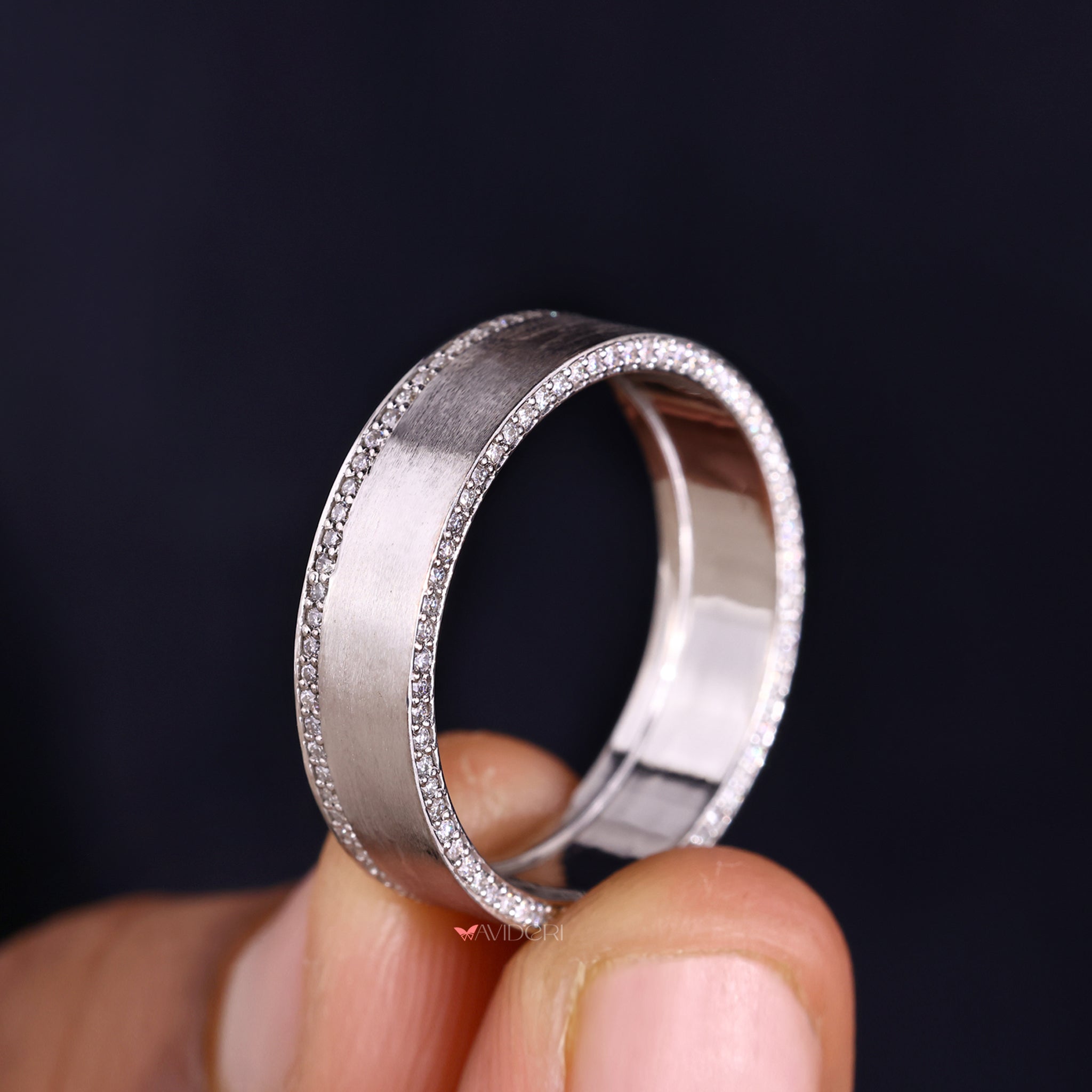 Simple mens wedding band displays timeless charm and subtle design.
