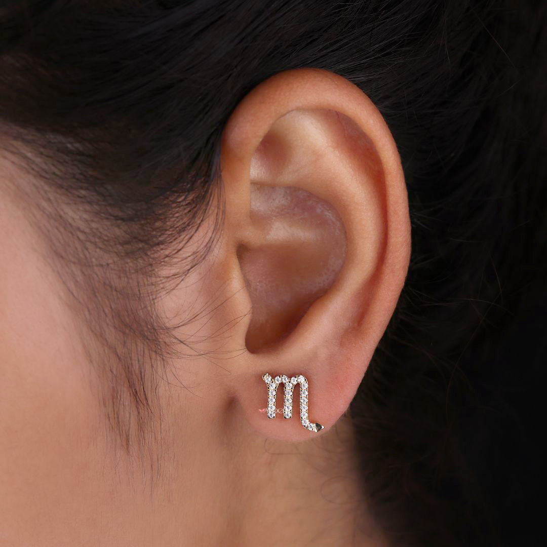 Scorpio zodiac earrings with intricate celestial detailing
