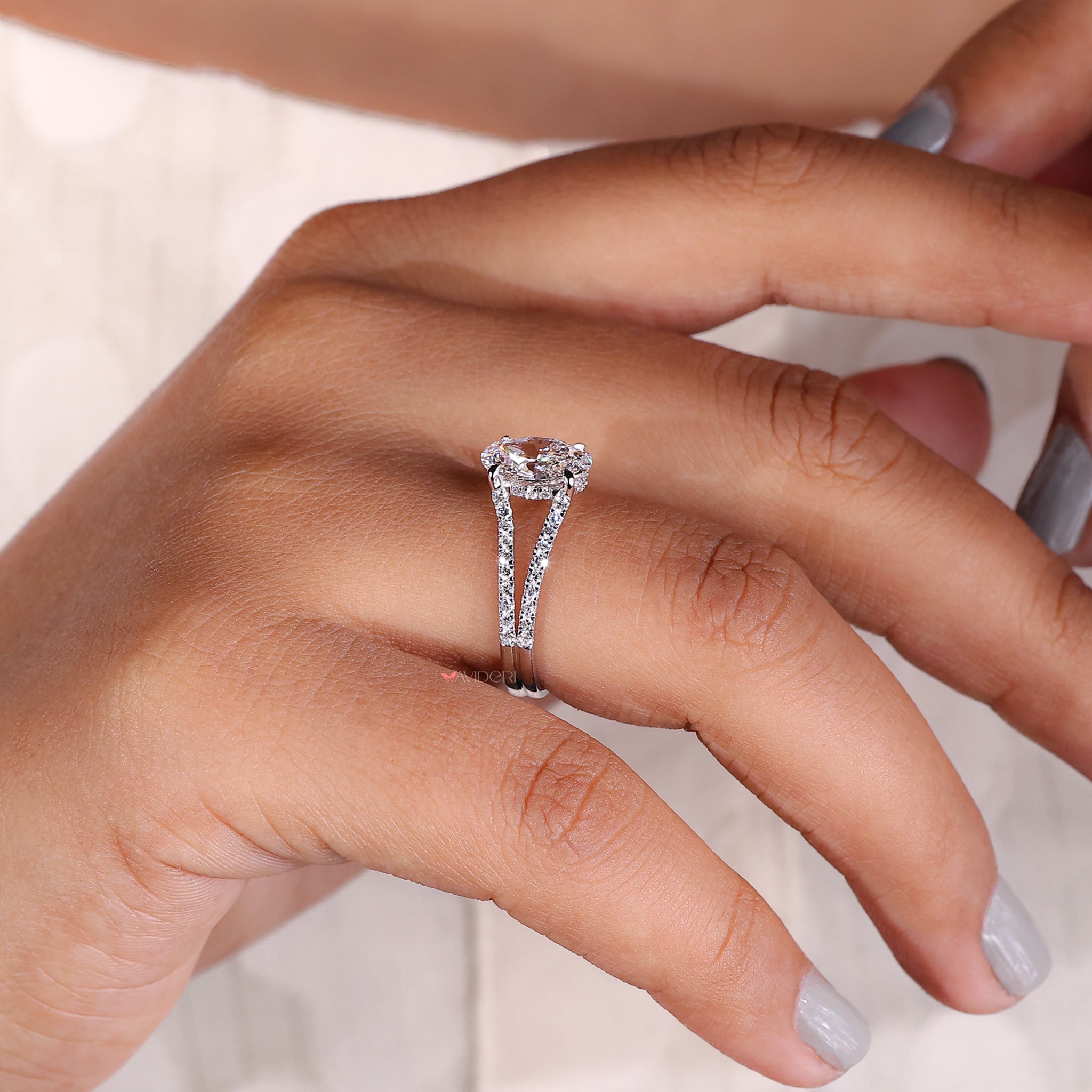 Classic halo ring with a beautifully detailed band, making it a perfect choice for your special moment.