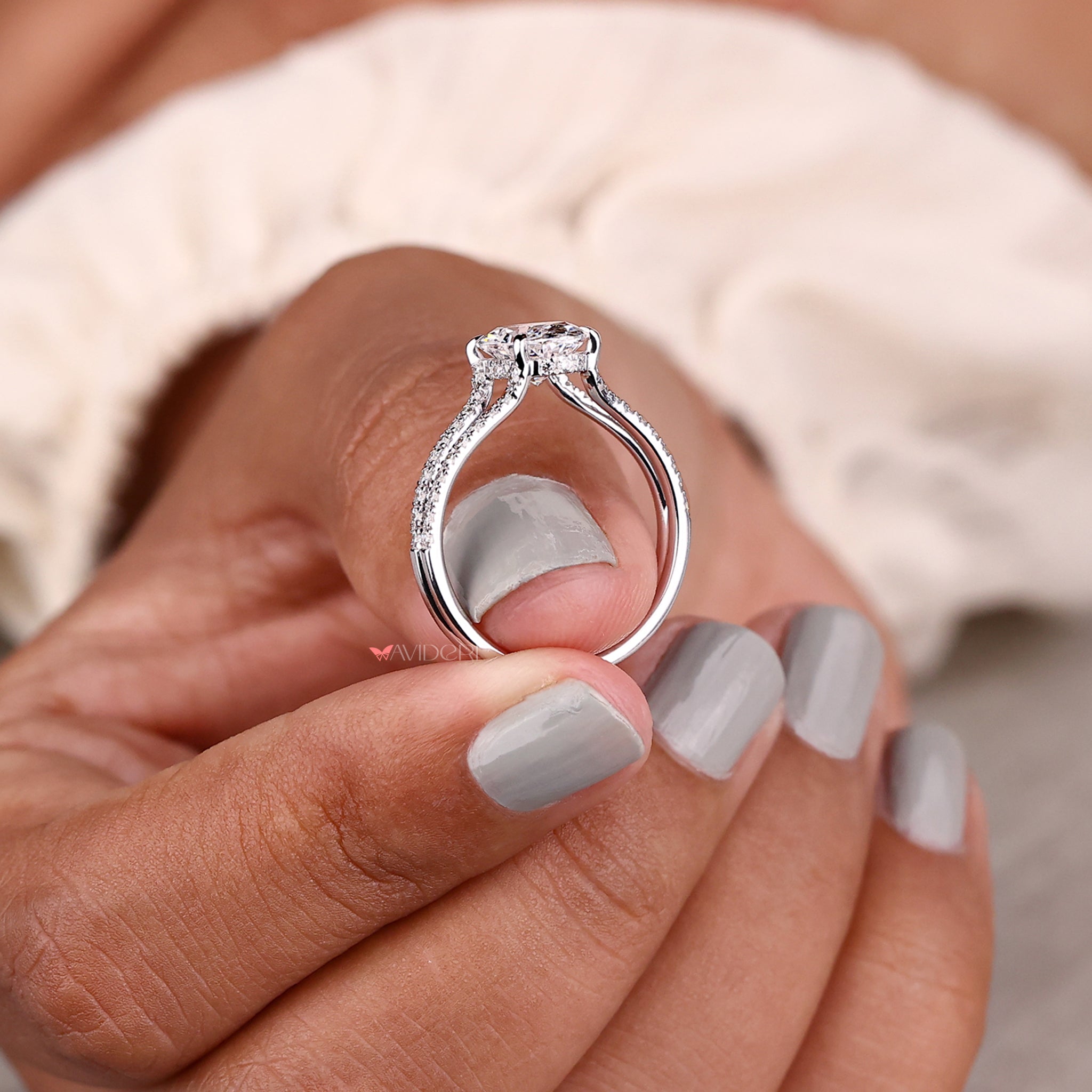 Hidden halo engagement ring designed with elegance and precision to elevate the beauty of the diamond.