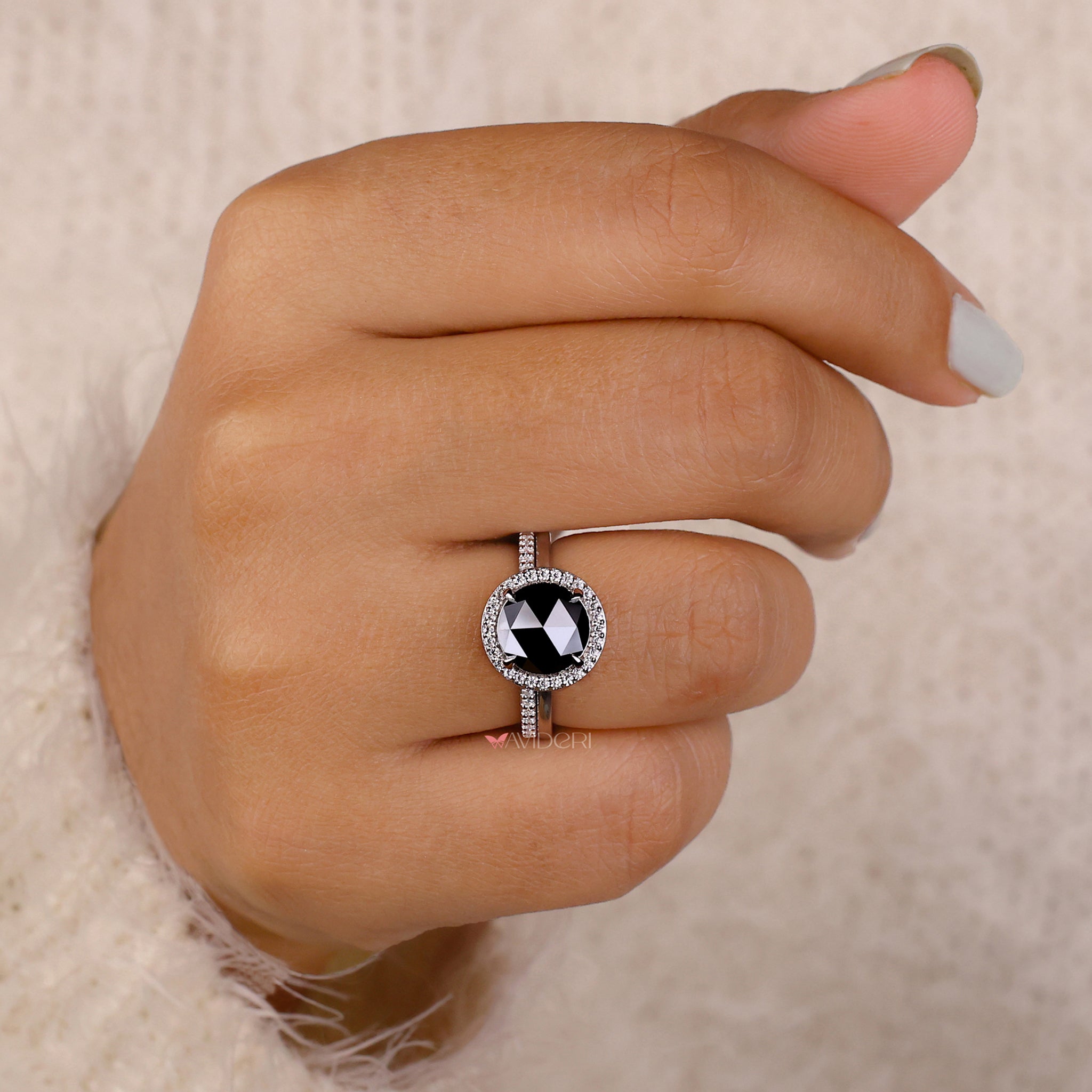 Round cut moissanite engagement ring with rose cut design for elegance.