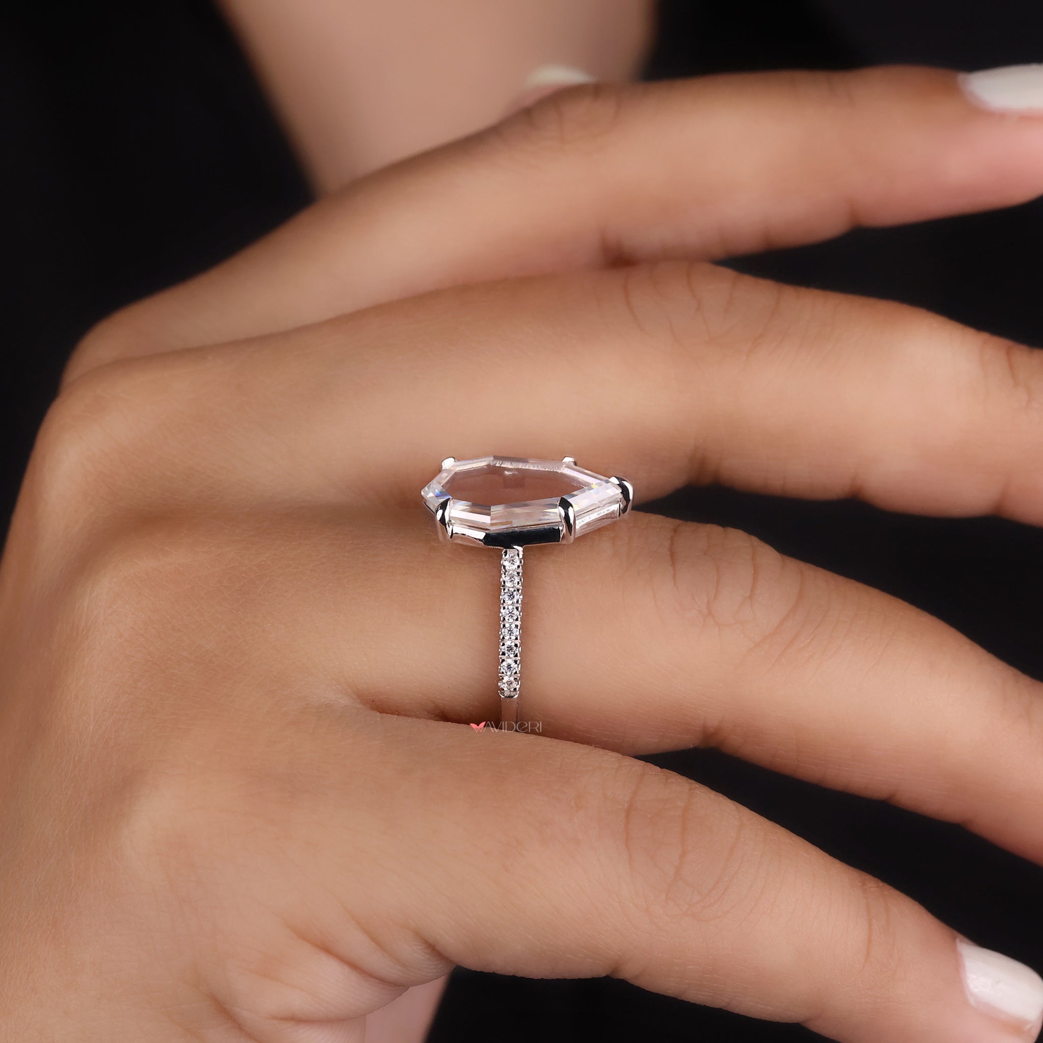 Pave setting ring featuring dazzling accent stones.