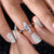 This marquise and round ring features a delicate, elegant design with distinct shapes in perfect harmony.
 This marquise and round ring features a delicate, elegant design with distinct shapes in perfect harmony.