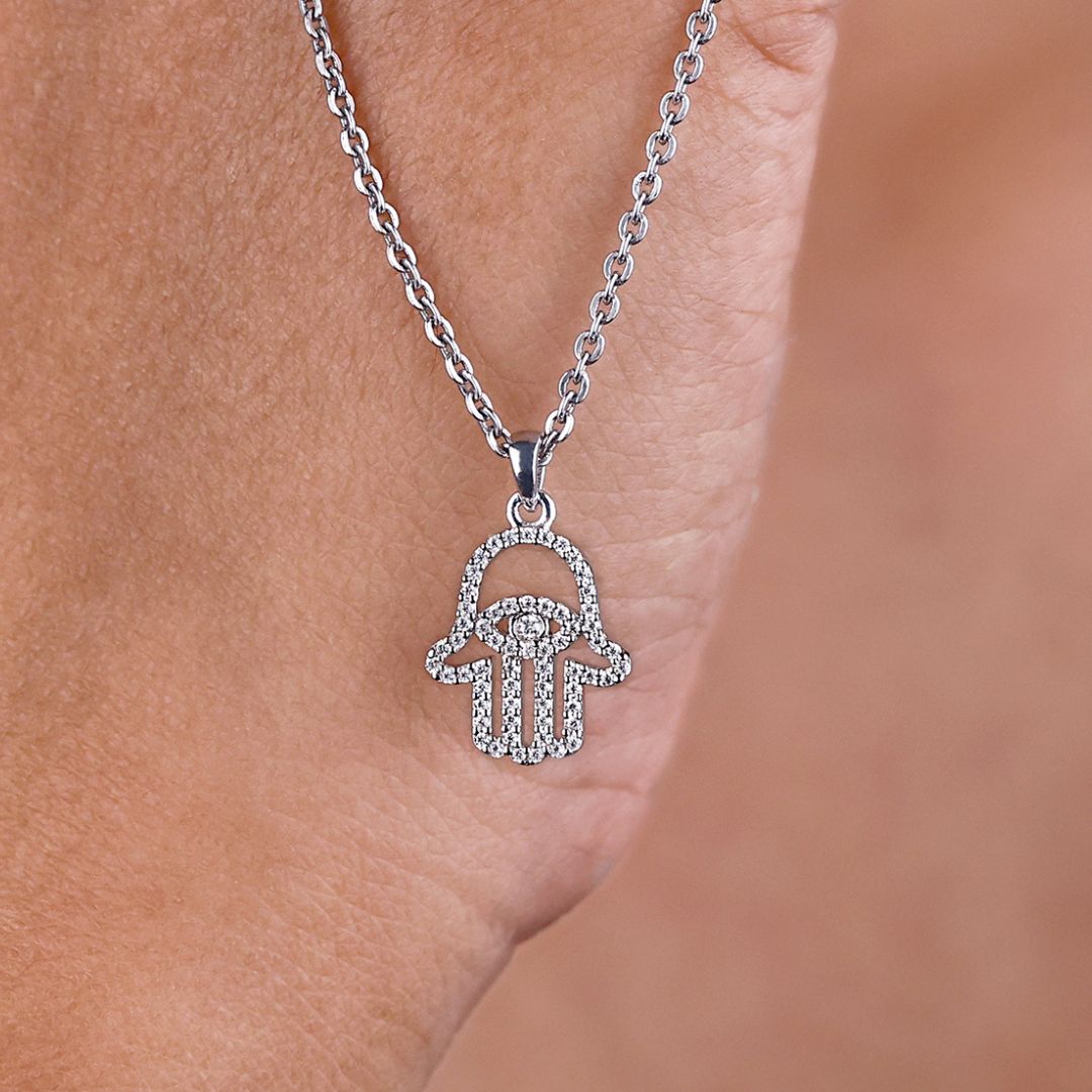 Hamsa Pendant Featuring Round Cut Moissanite