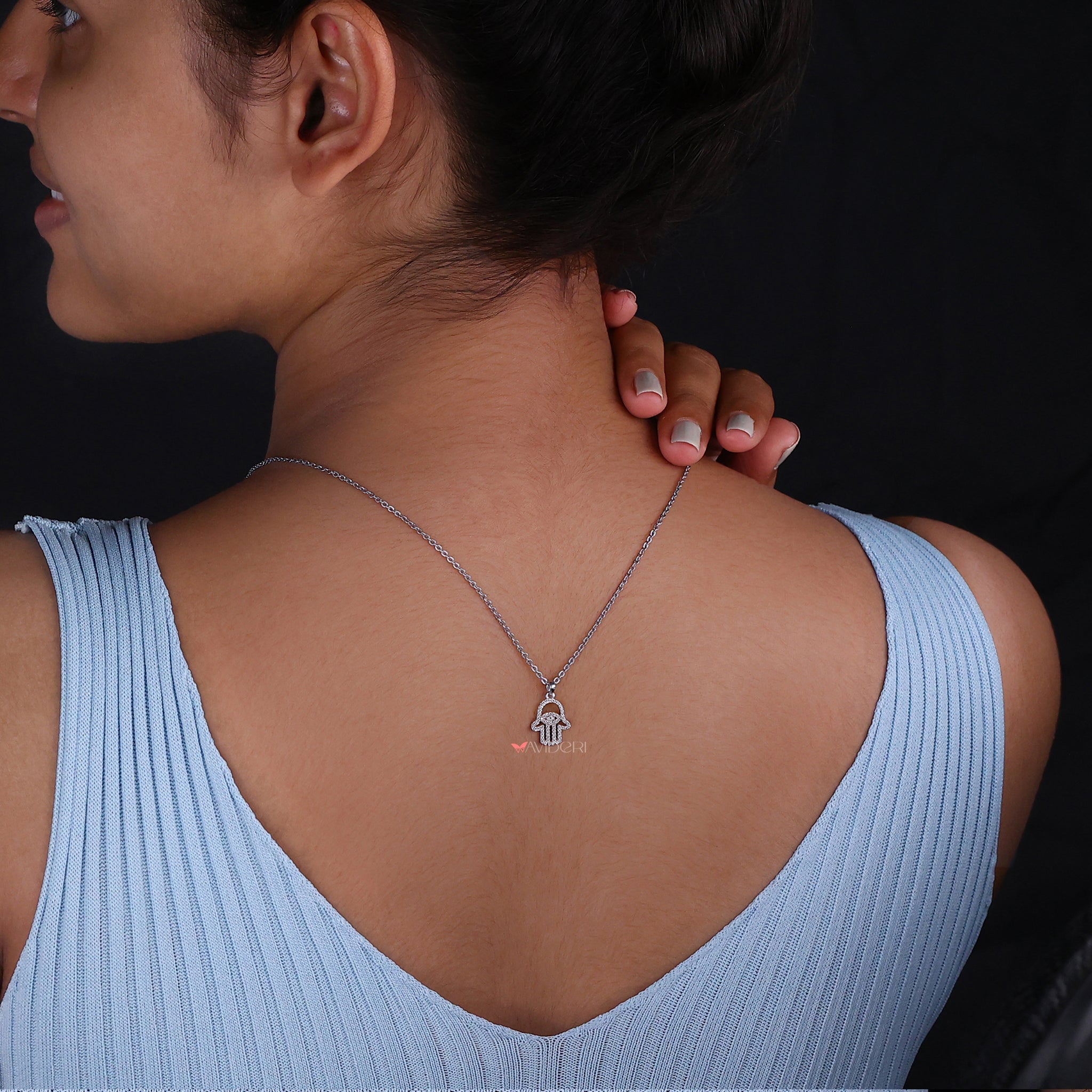 Hamsa Pendant Featuring Round Cut Moissanite