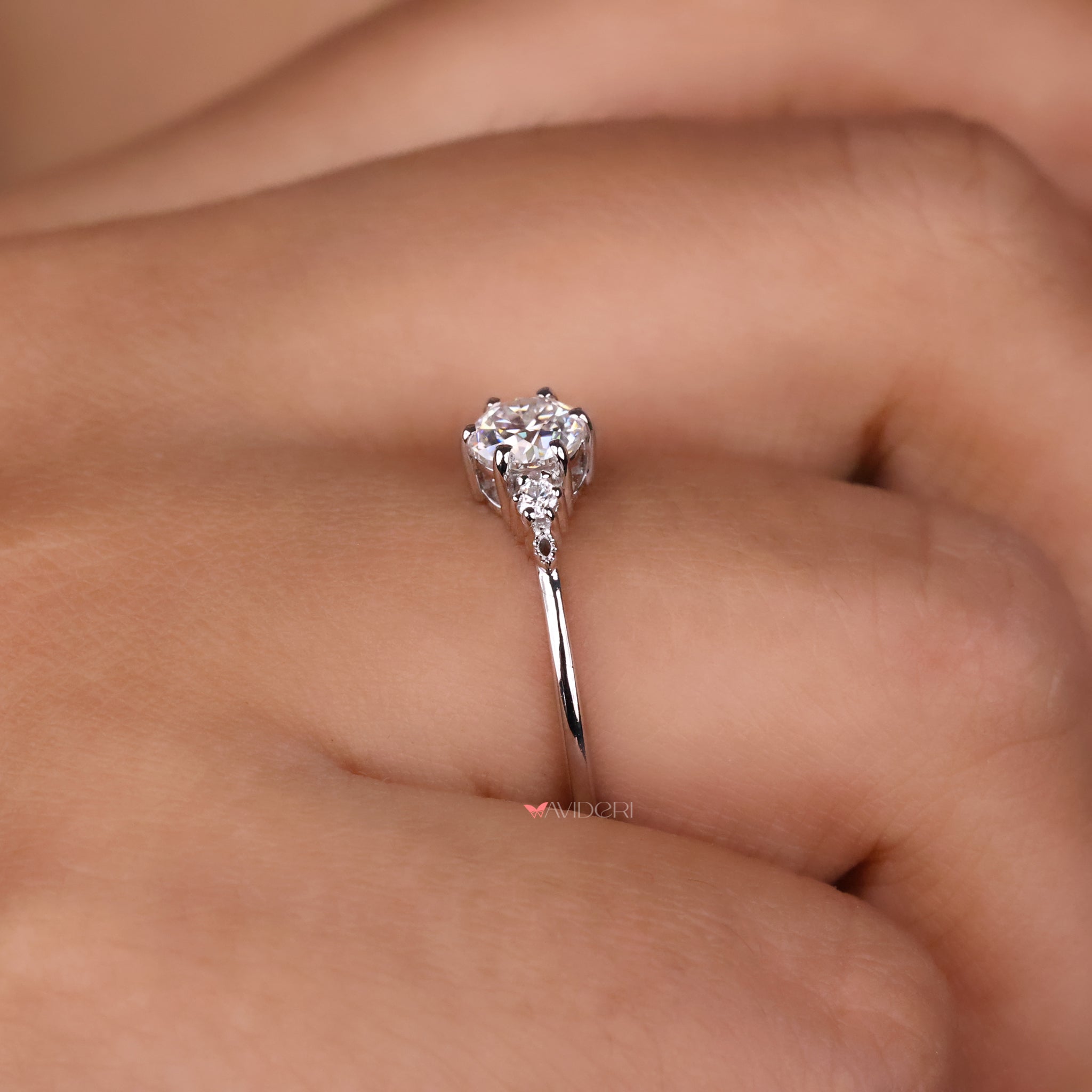 This white gold moissanite ring blends luster with ethical sparkle.