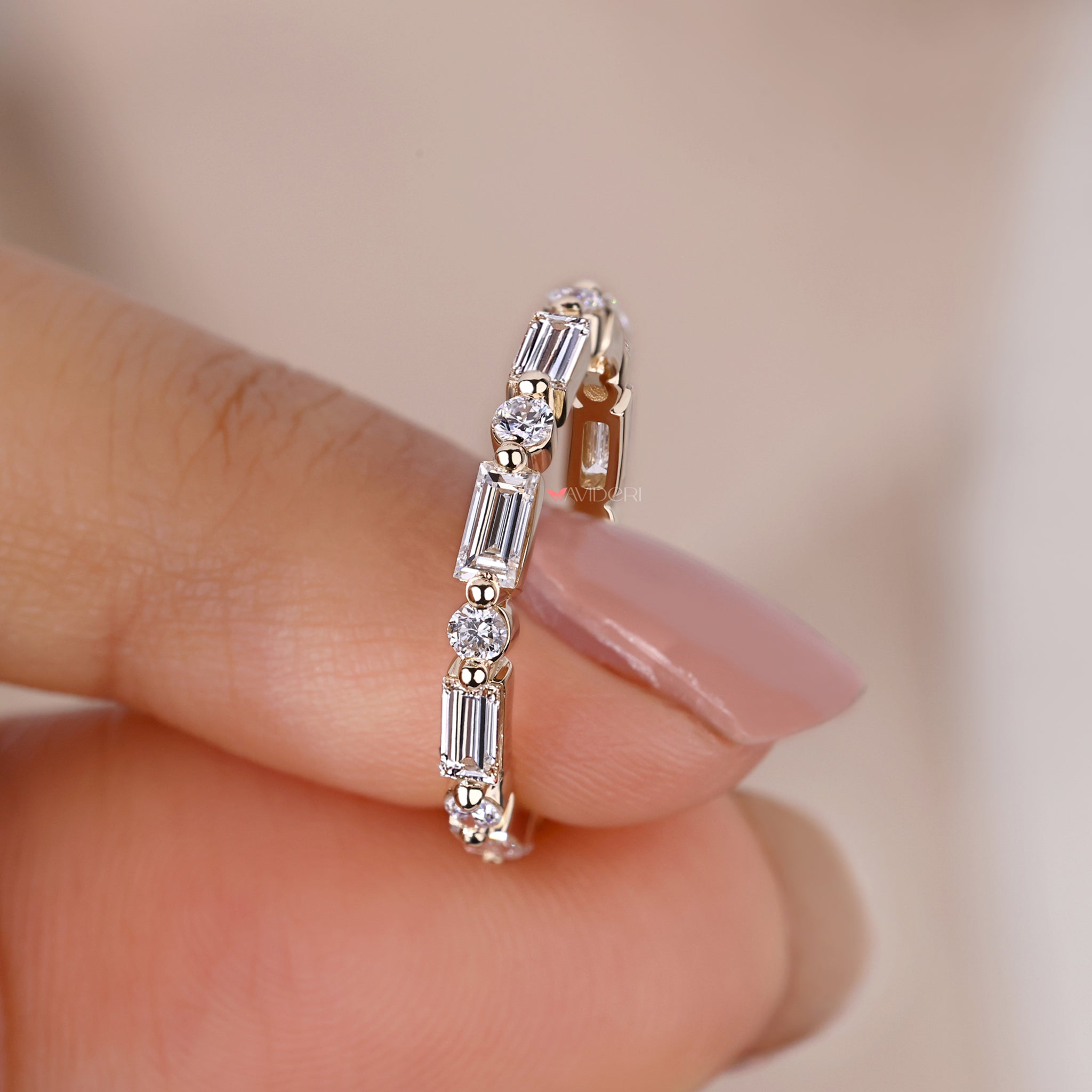 Shared prong wedding band with lab-grown diamonds.