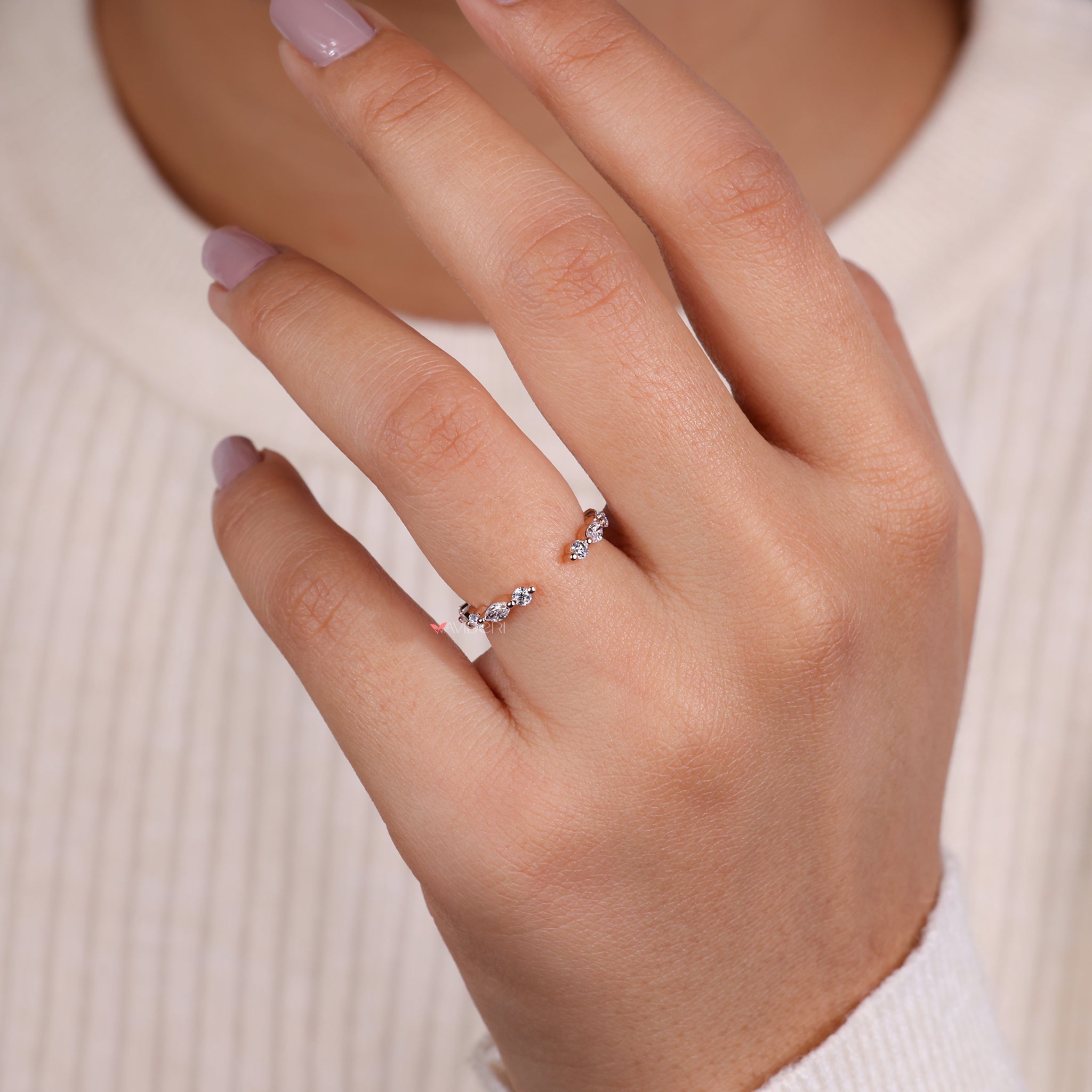 Shared prong wedding band with sparkling round diamonds.