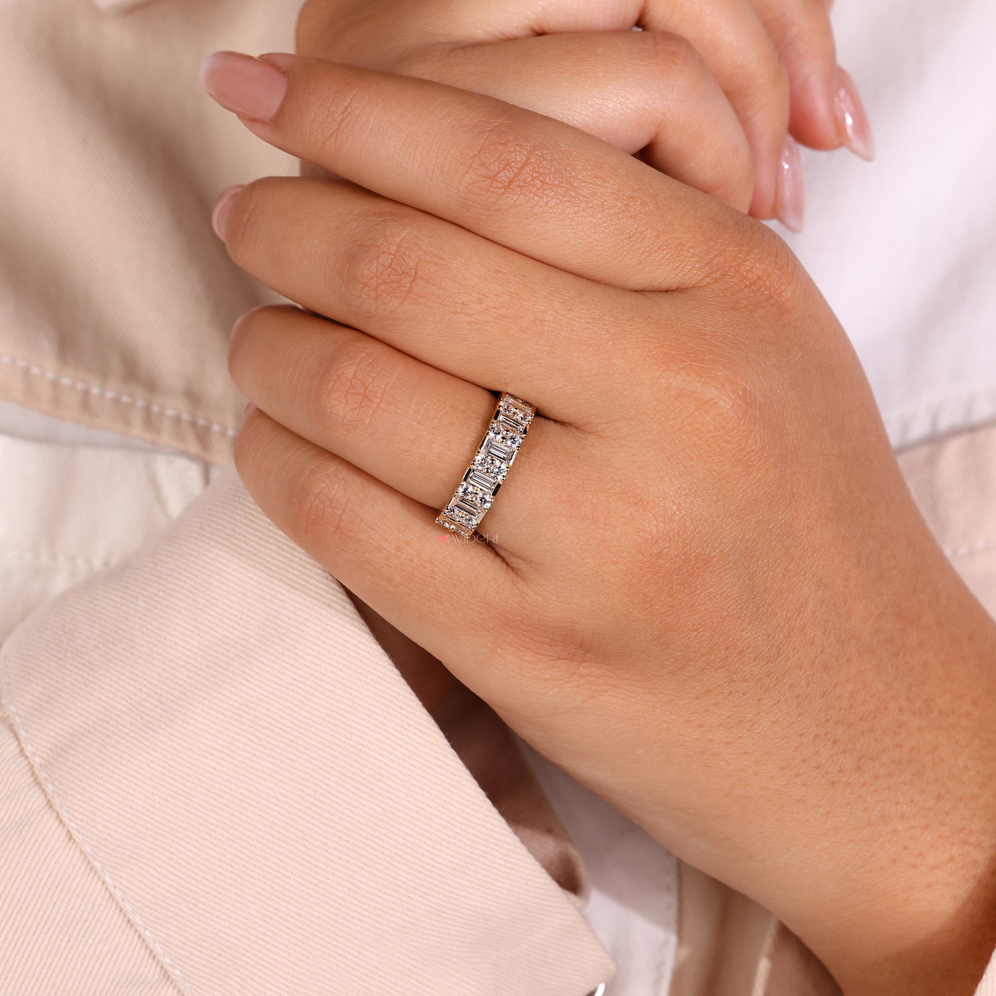 Baguette and round diamond ring with a classic design.