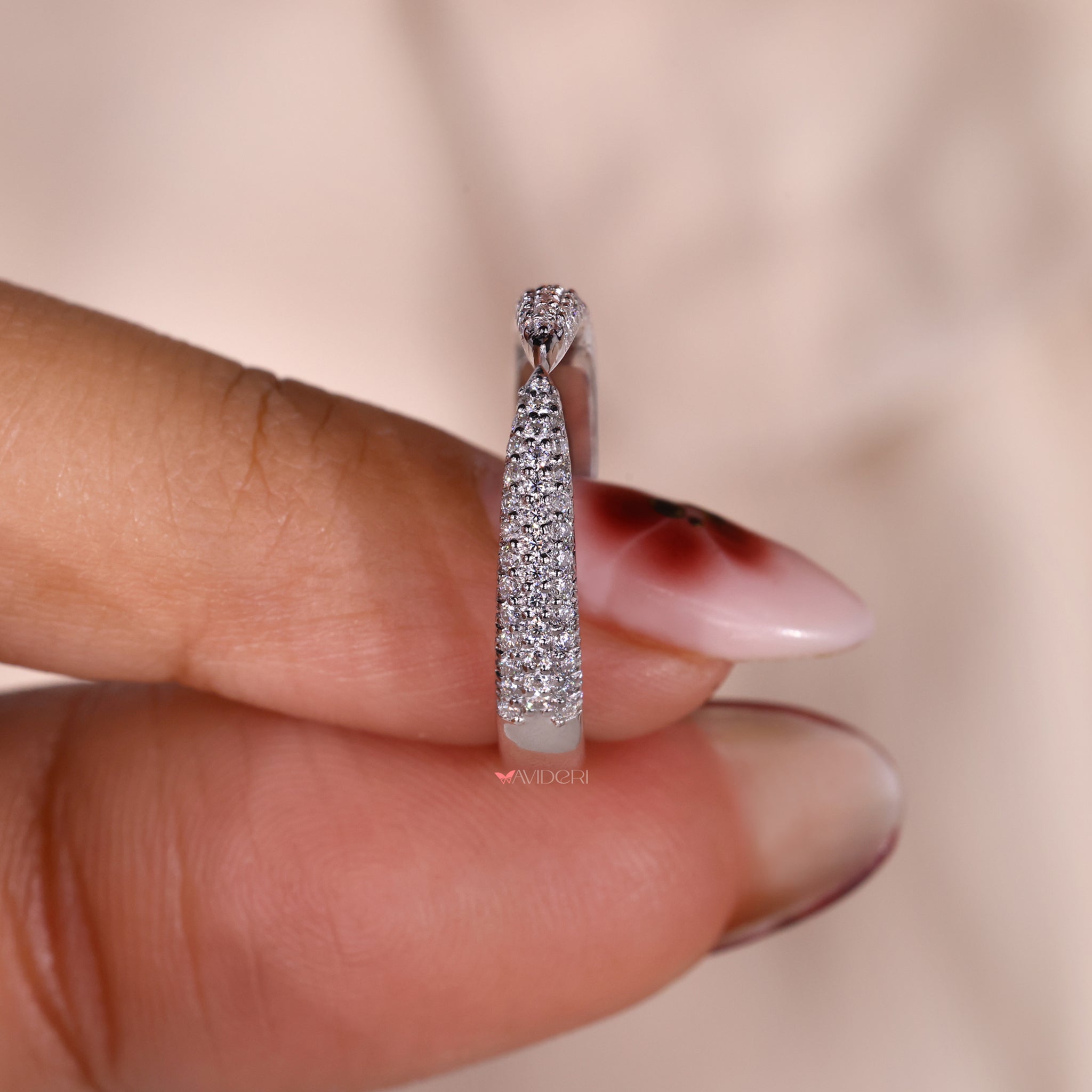 Round cut open gap wedding band in white gold.