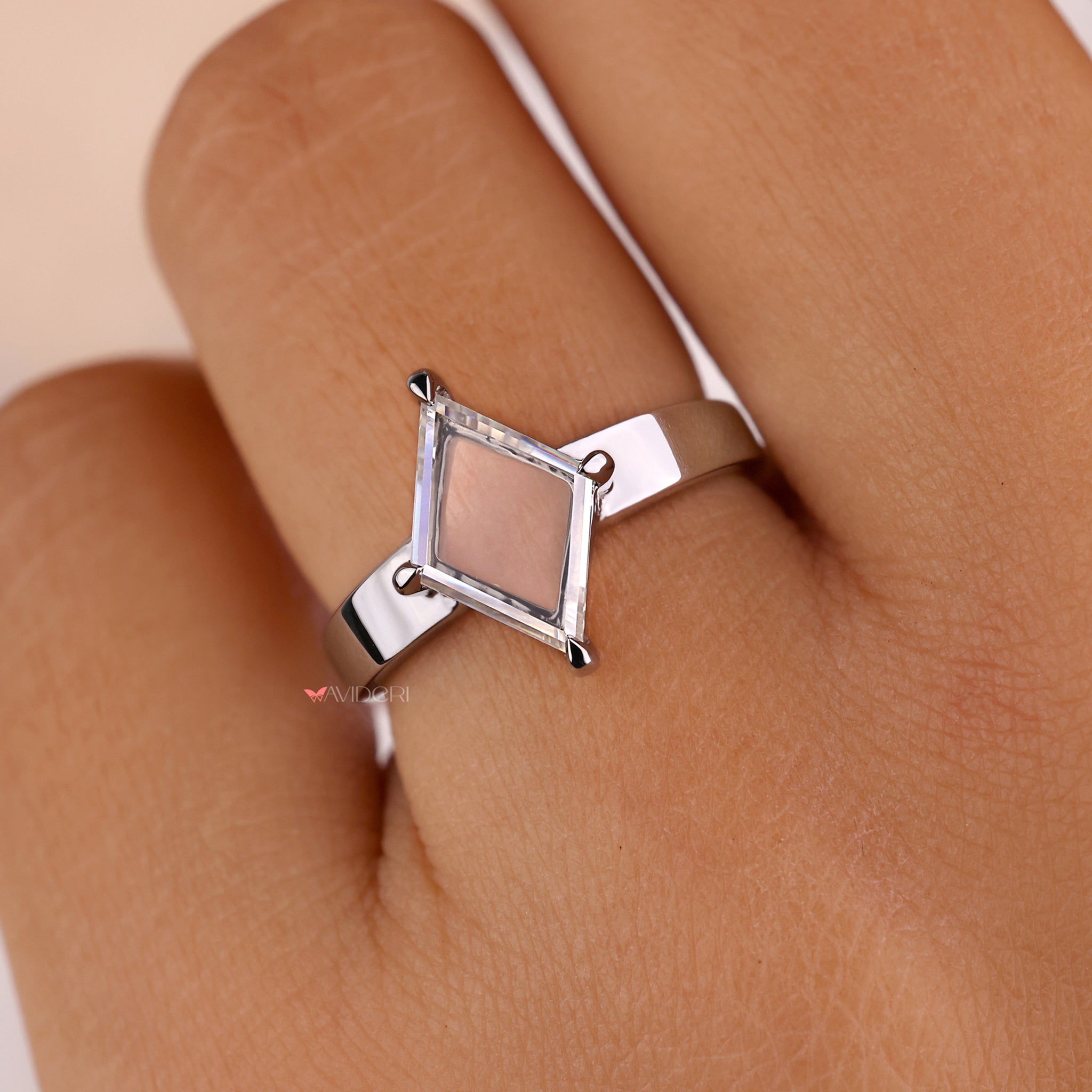 Compass prong engagement ring with a lozenge portrait Lab Grown Diamond, handmade with care.