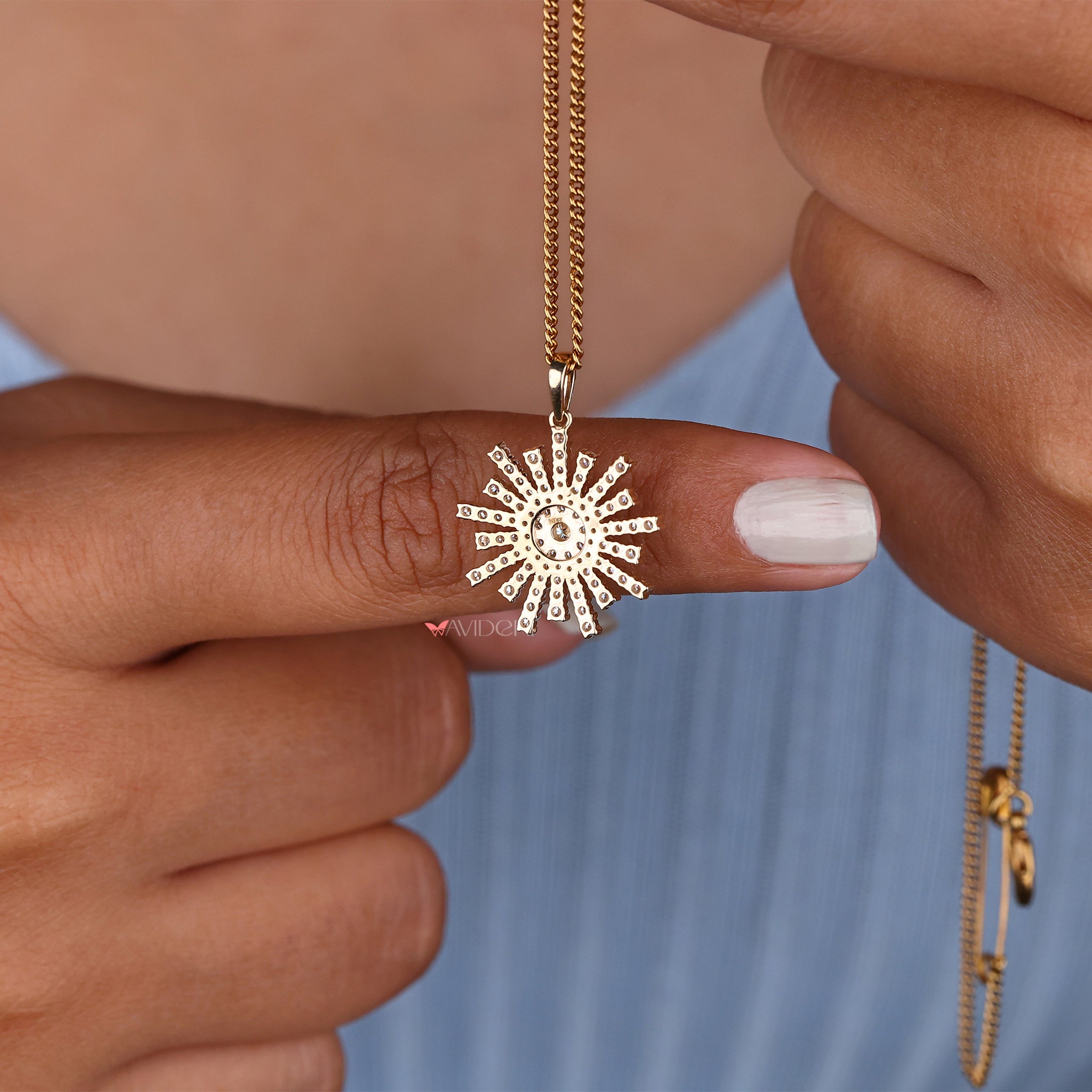 Yellow gold pendant with a warm, polished finish.