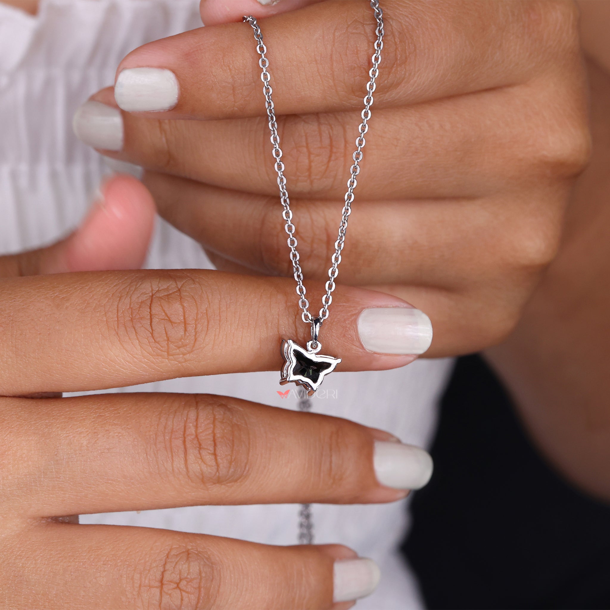 White gold pendant featuring a butterfly pendant for added charm.