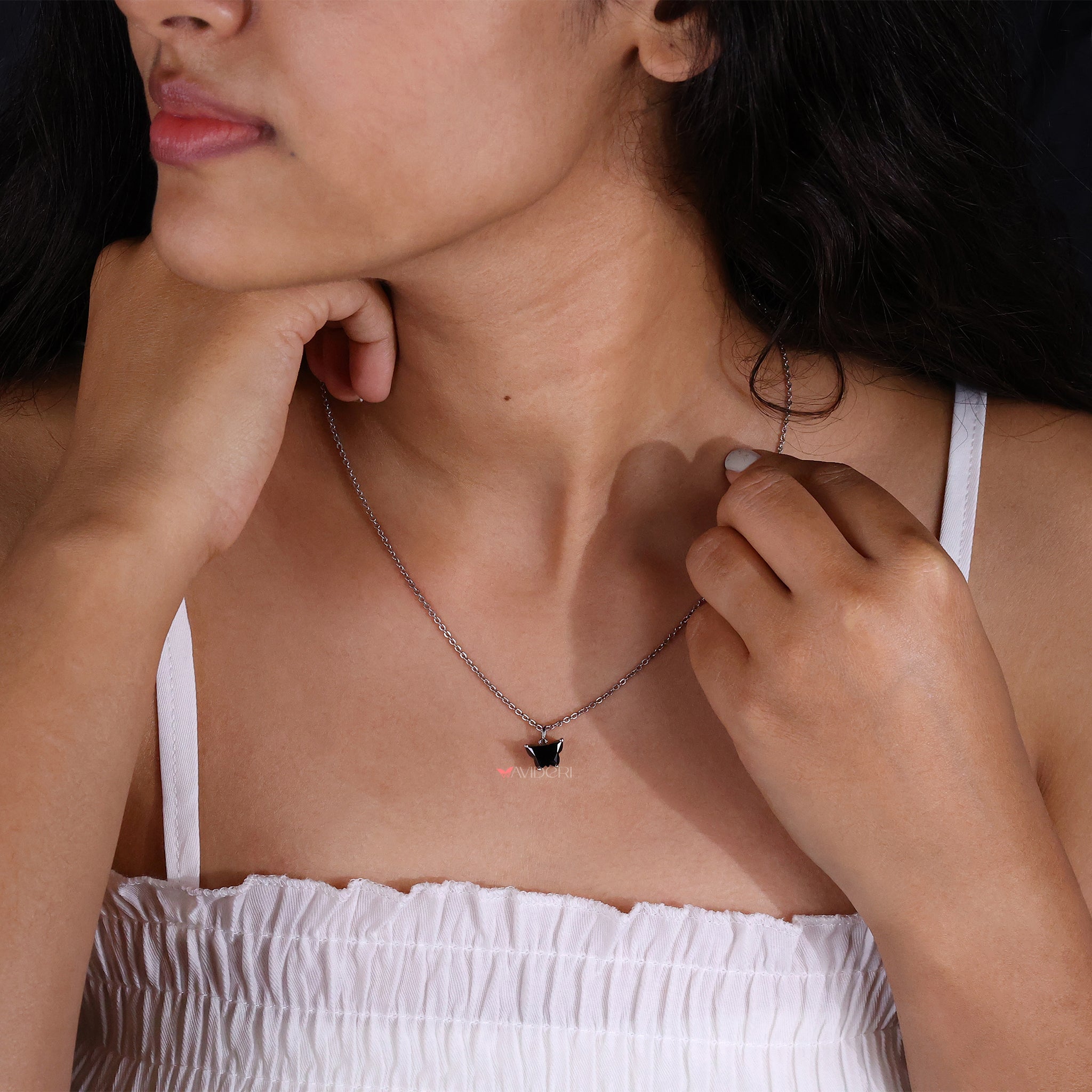 Solitaire pendant gold with a butterfly design for a stunning look.