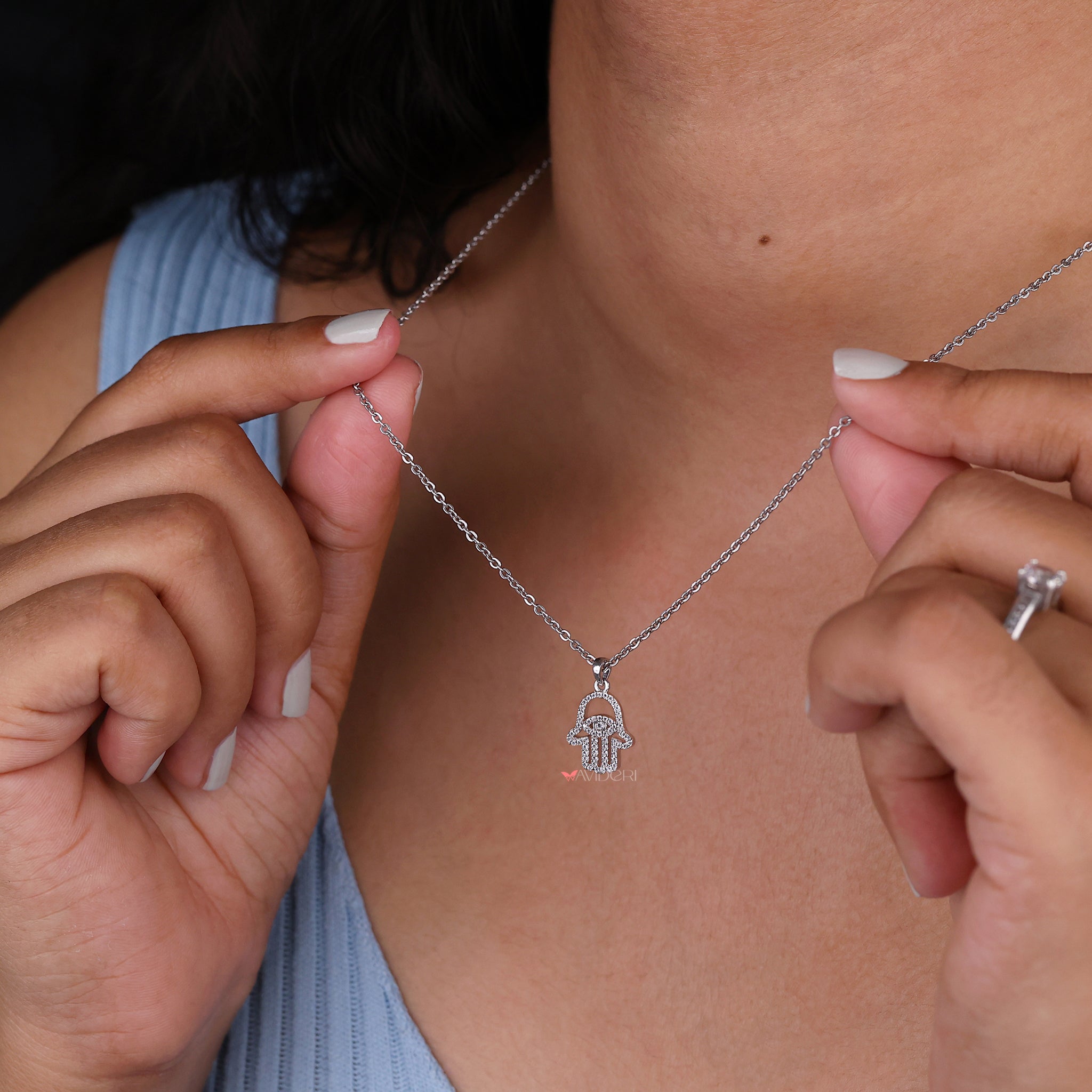 Hamsa Pendant Featuring Round Cut Moissanite