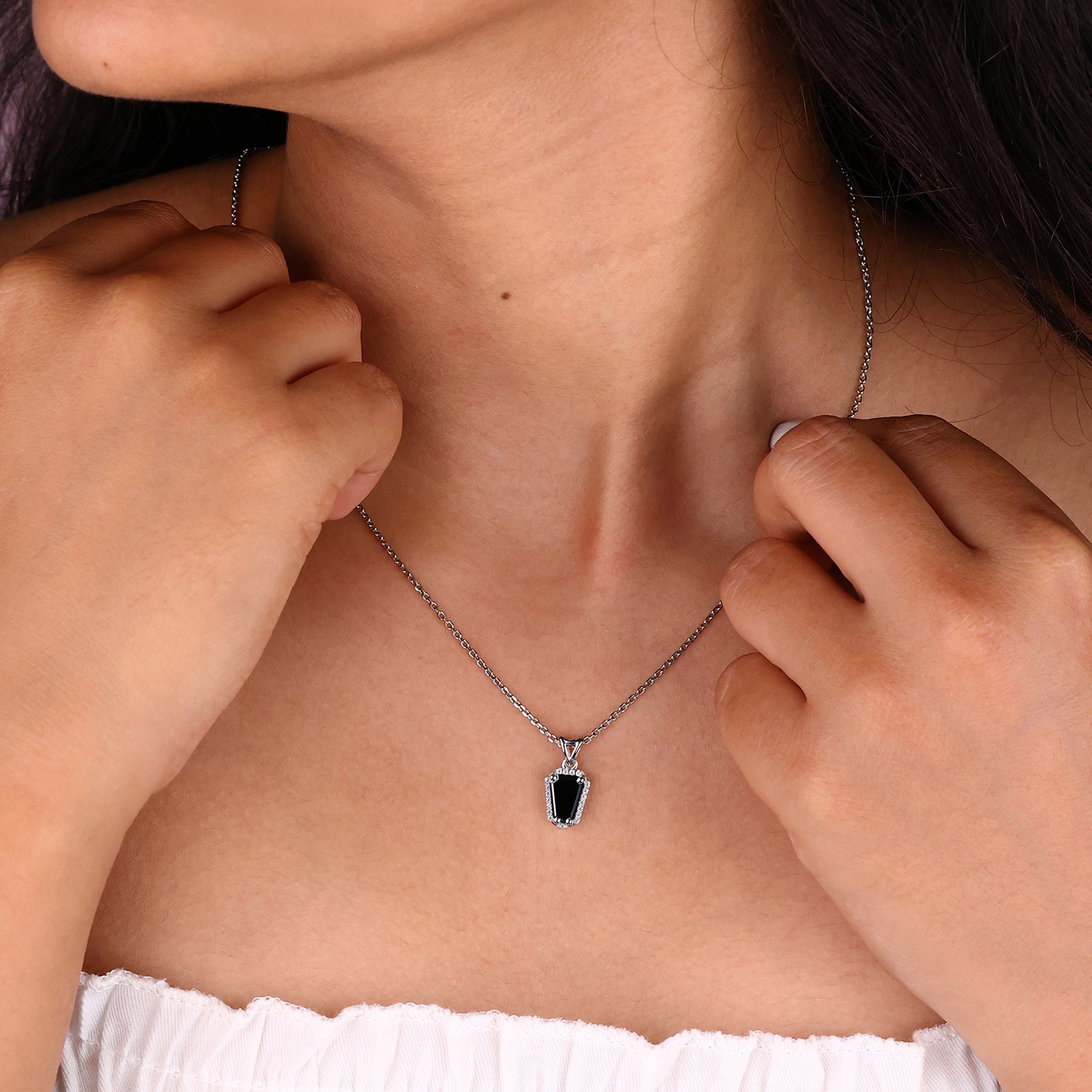 Round cut pendant with a coffin pendant for a unique look.