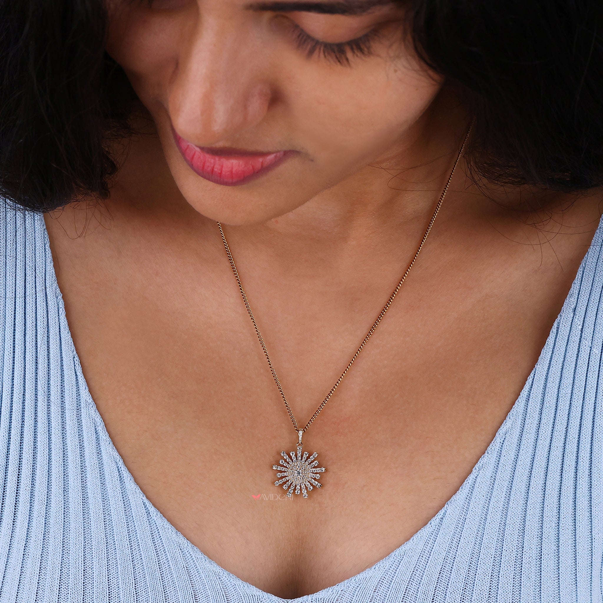 Starburst pendant with a striking design.