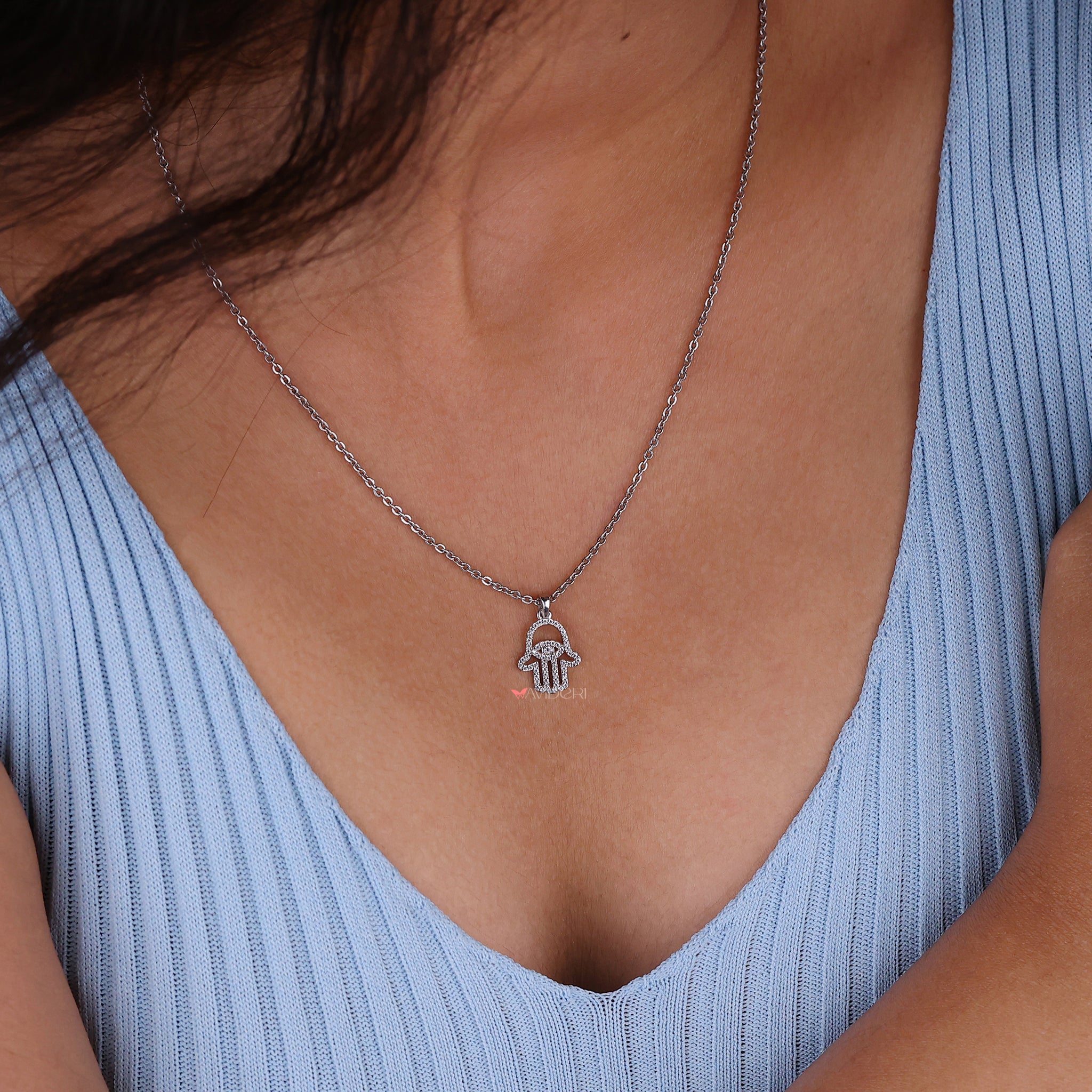 Hamsa Pendant Featuring Round Cut Moissanite