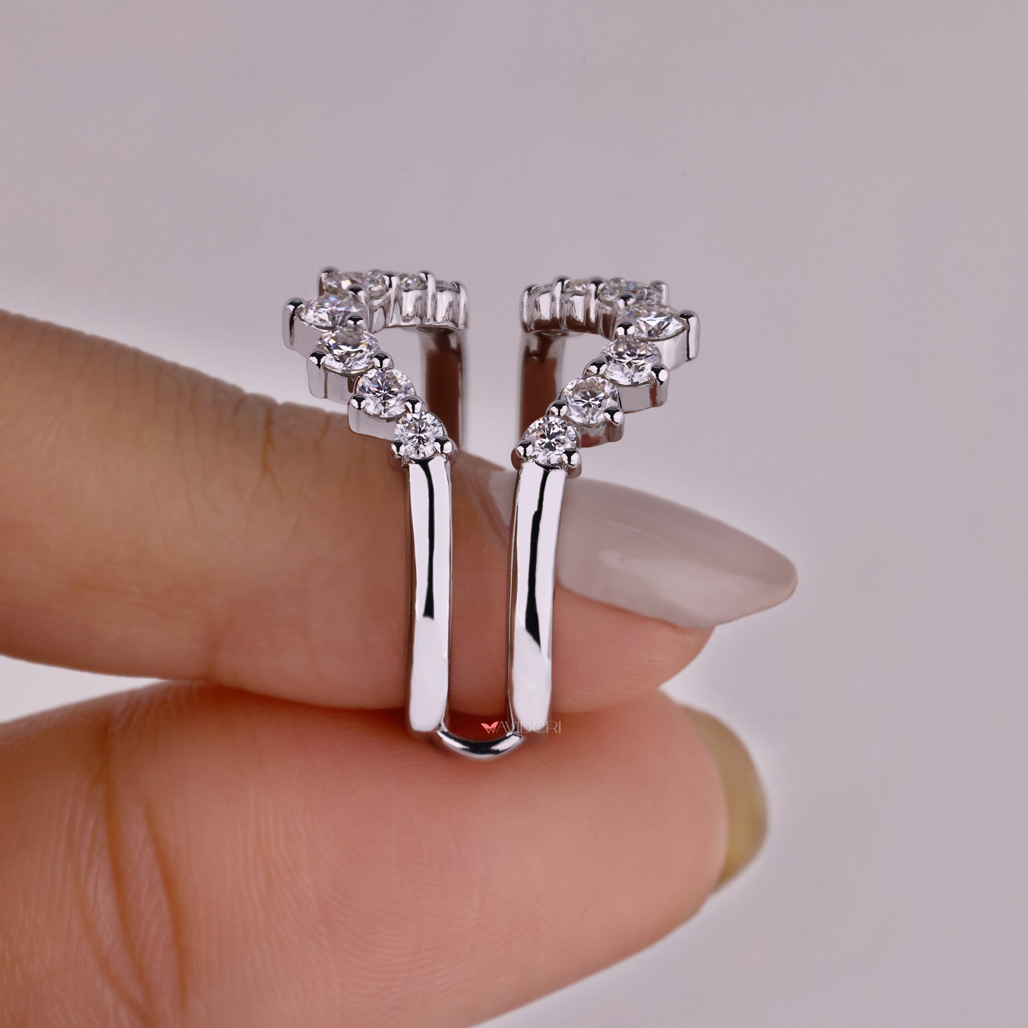 Minimalist wedding band with lab grown diamonds.