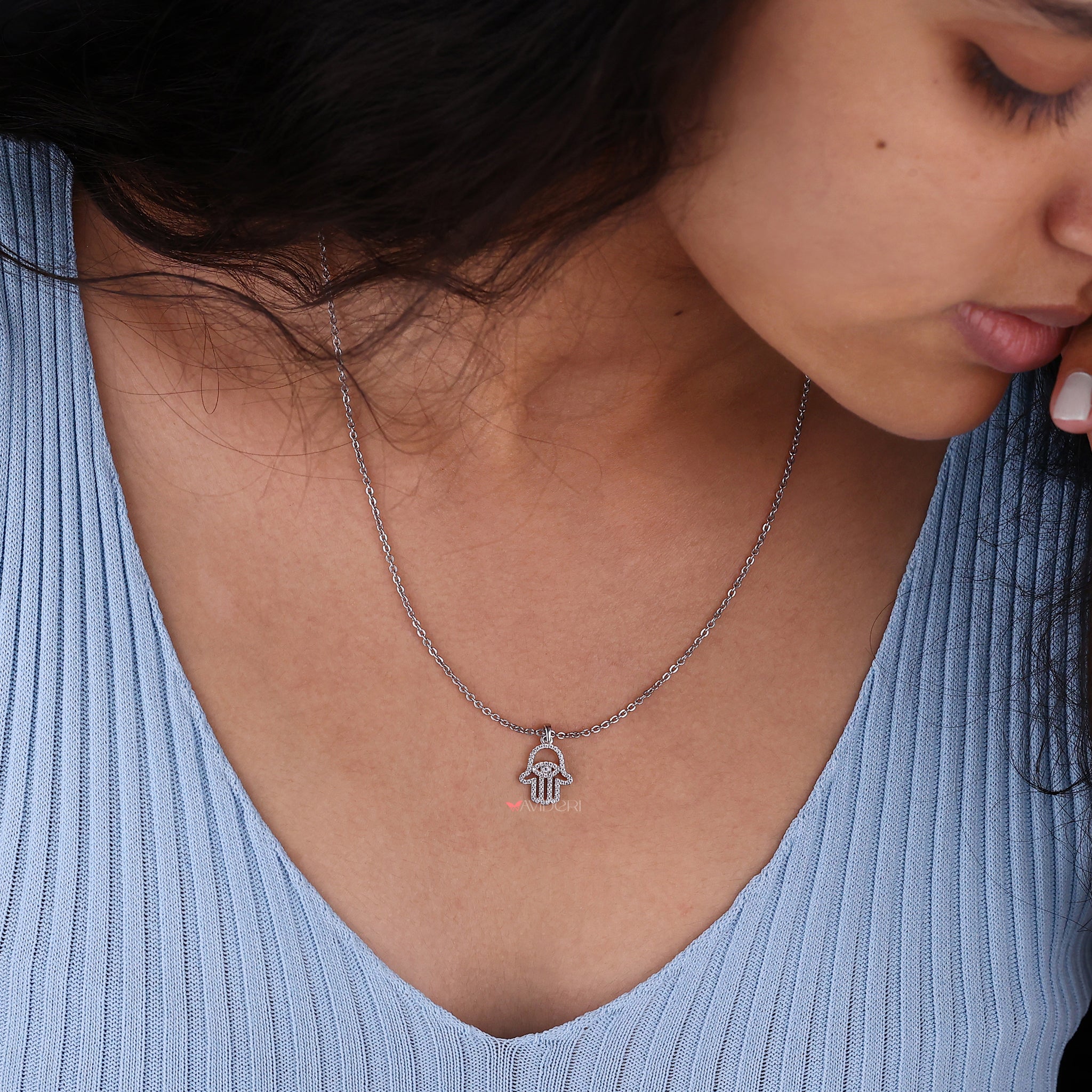 Hamsa Pendant Featuring Round Cut Moissanite