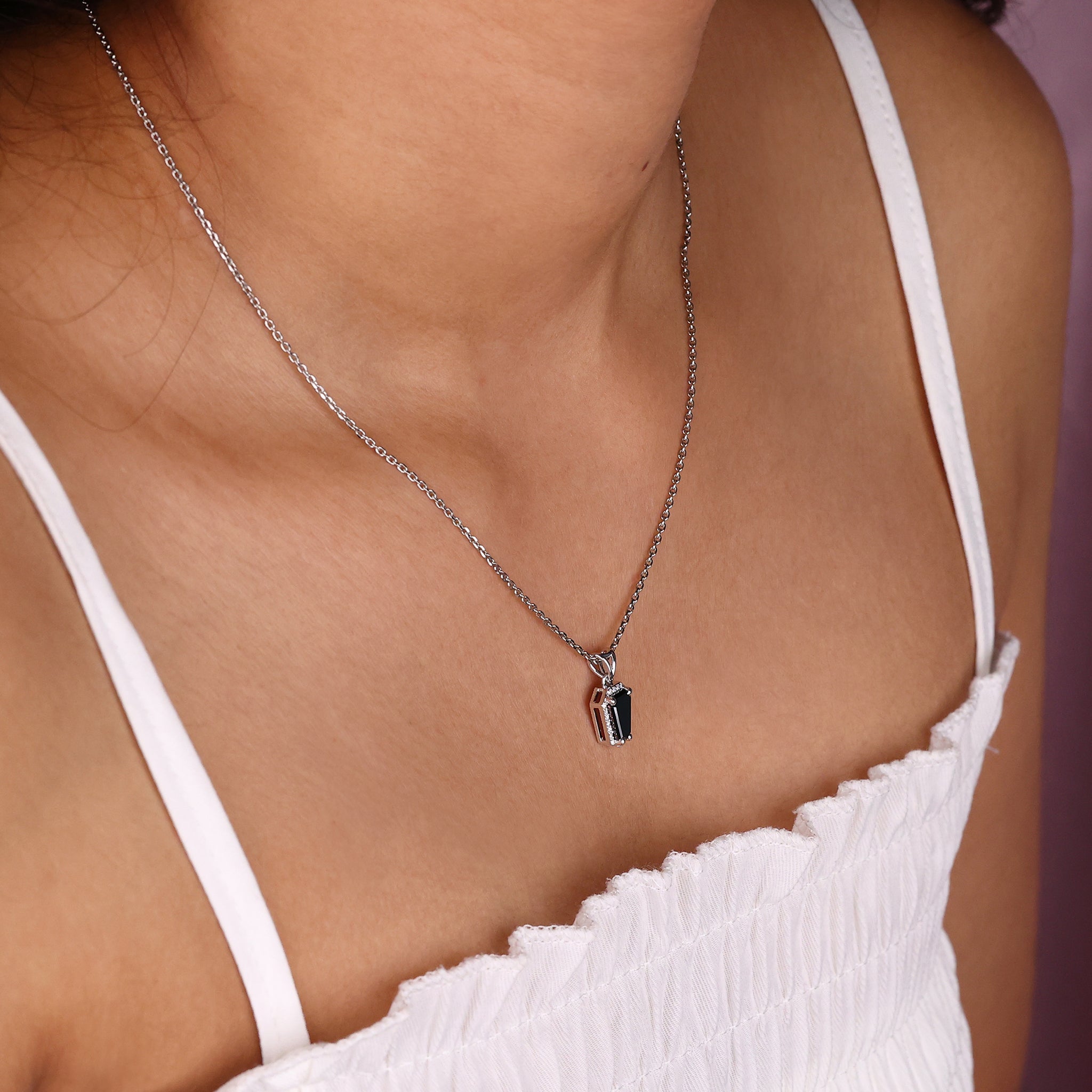 Avideri pendant with a coffin pendant for a luxurious finish.