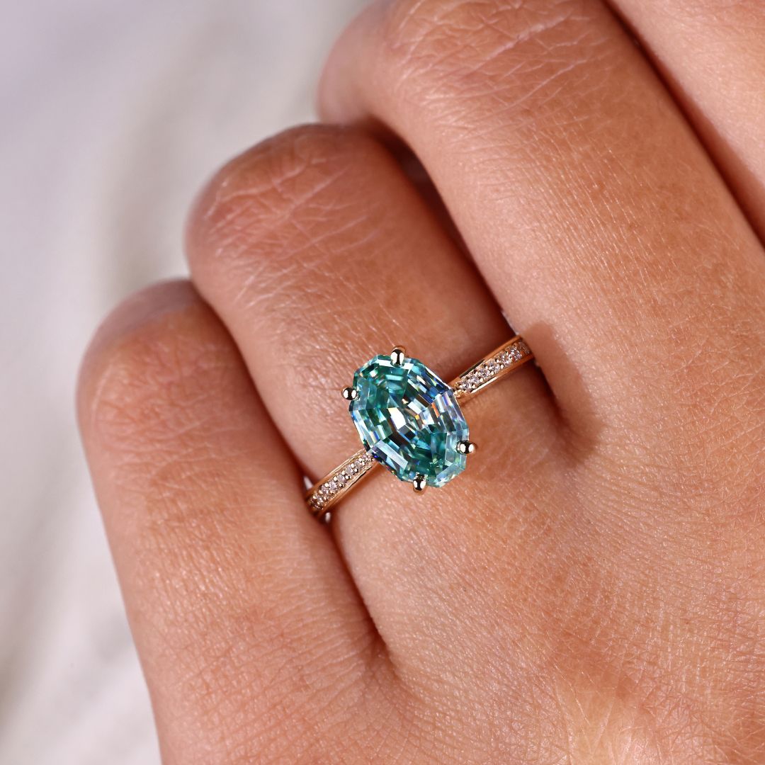 This moissanite cathedral ring shines in a unique setting.