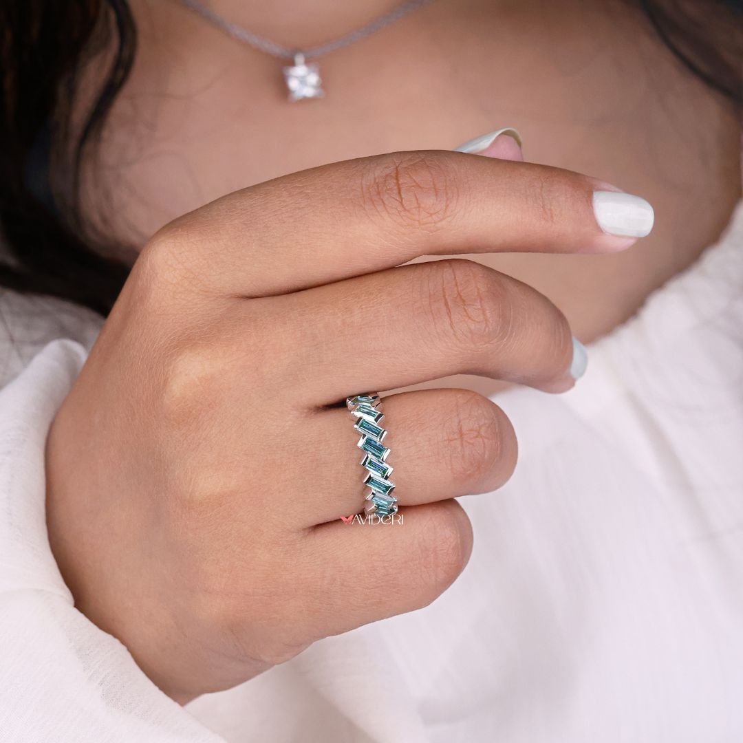 Baguette cut wedding band delivers precision-cut brilliance in a modern, refined design.