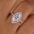 Gold marquise cut ring set in a sleek band
 Gold marquise cut ring set in a sleek band