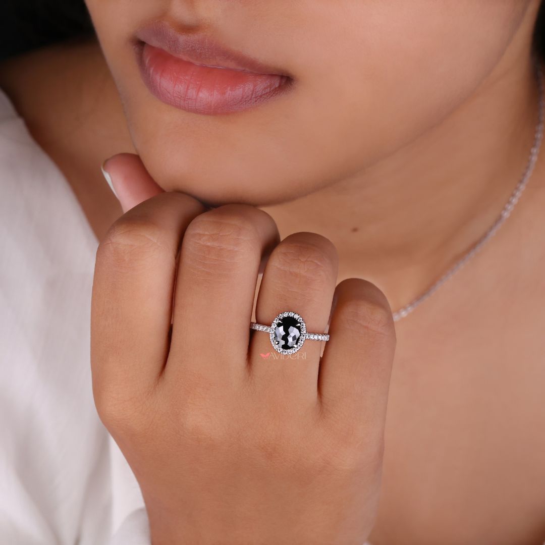 Pave setting ring with oval moissanite stone for added brilliance.