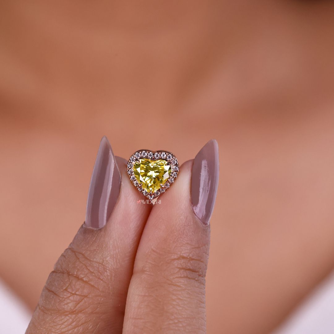 Pendant heart design featuring a dazzling moissanite halo.