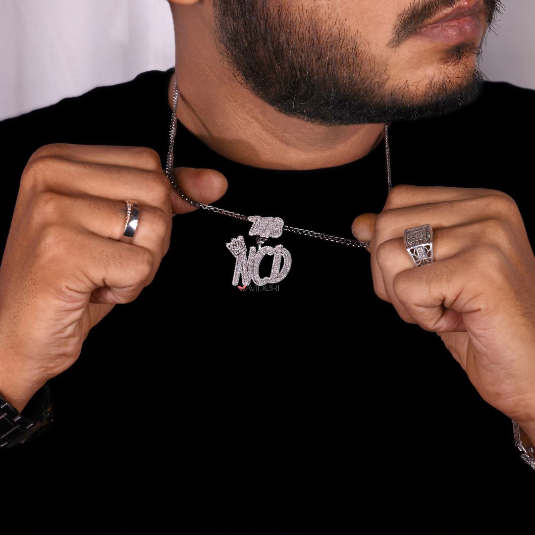 Personalized letter pendant with moissanite accents.