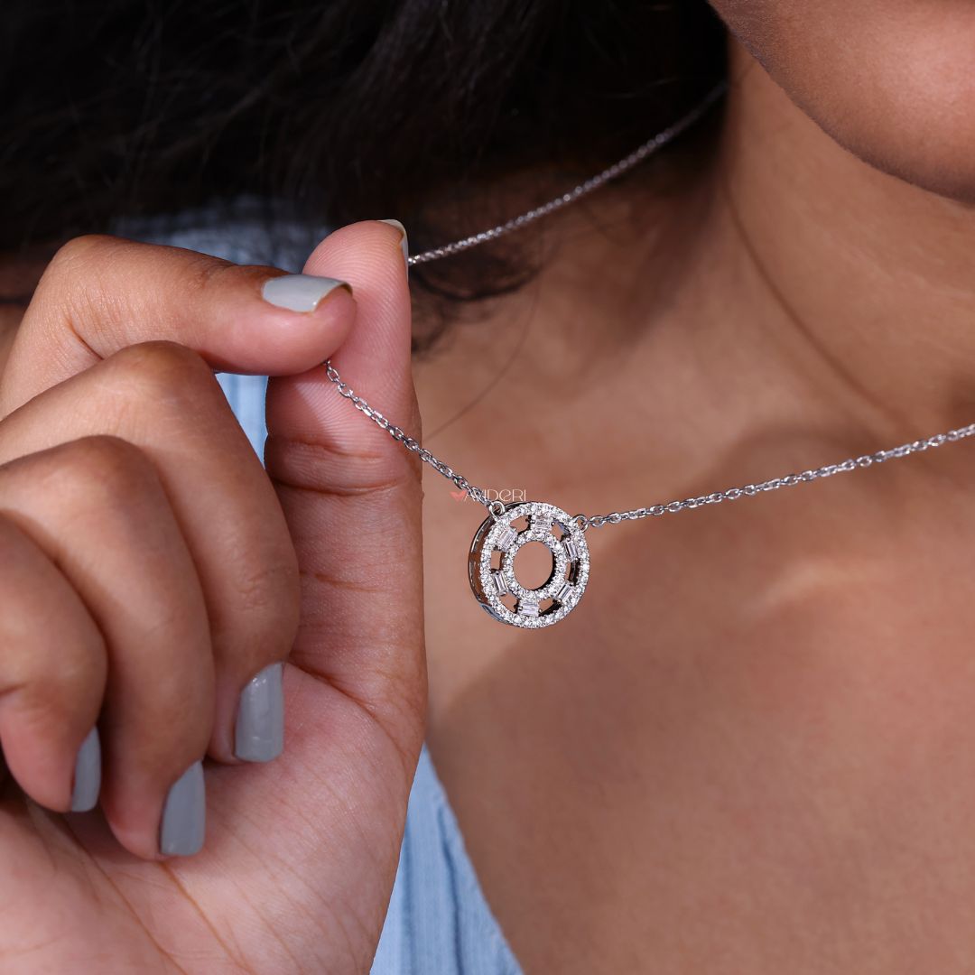 Handmade pendant with diamond accents.