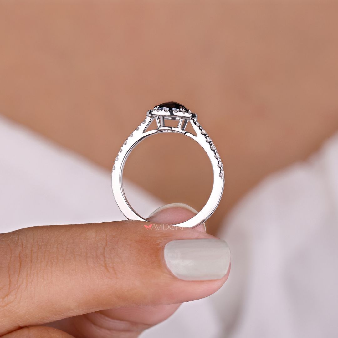 White gold engagement ring featuring an oval moissanite ring design.