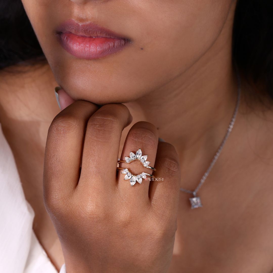 This curved wedding band fits perfectly with engagement rings.