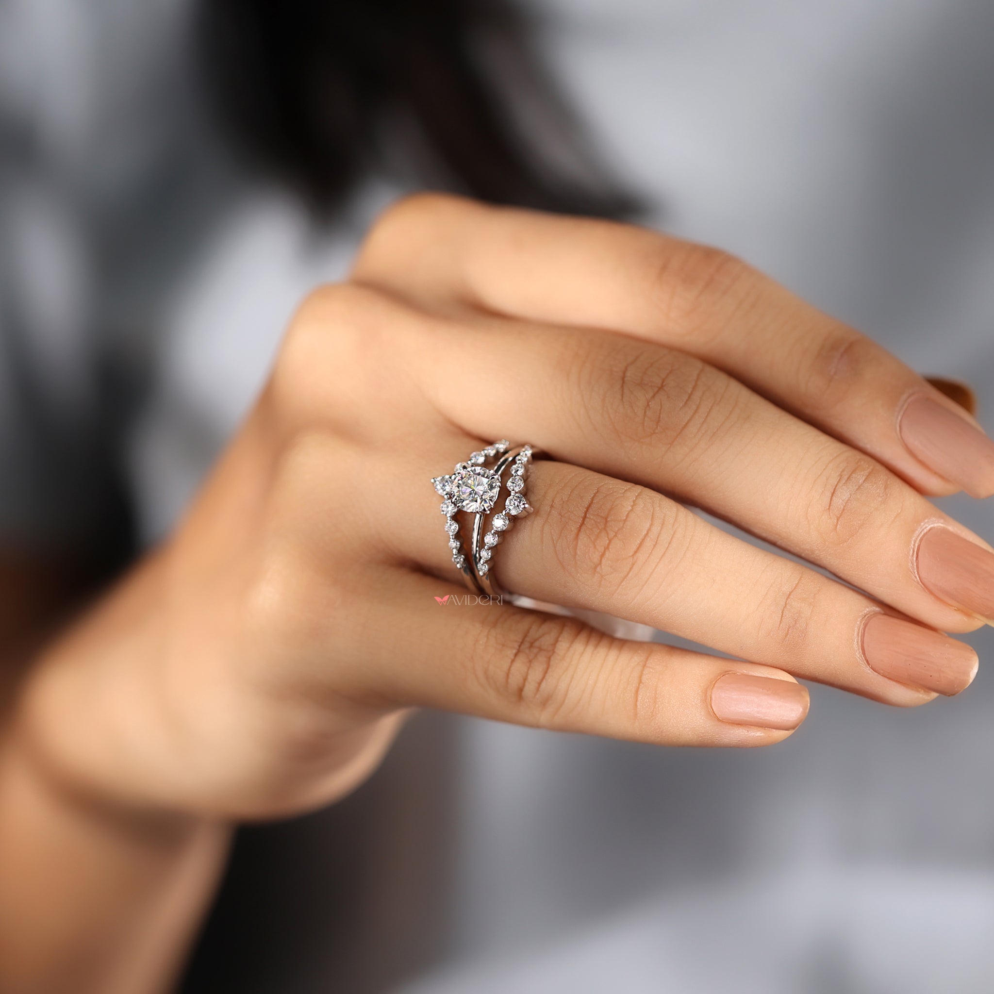 Round cut ring with a gold solitaire setting.