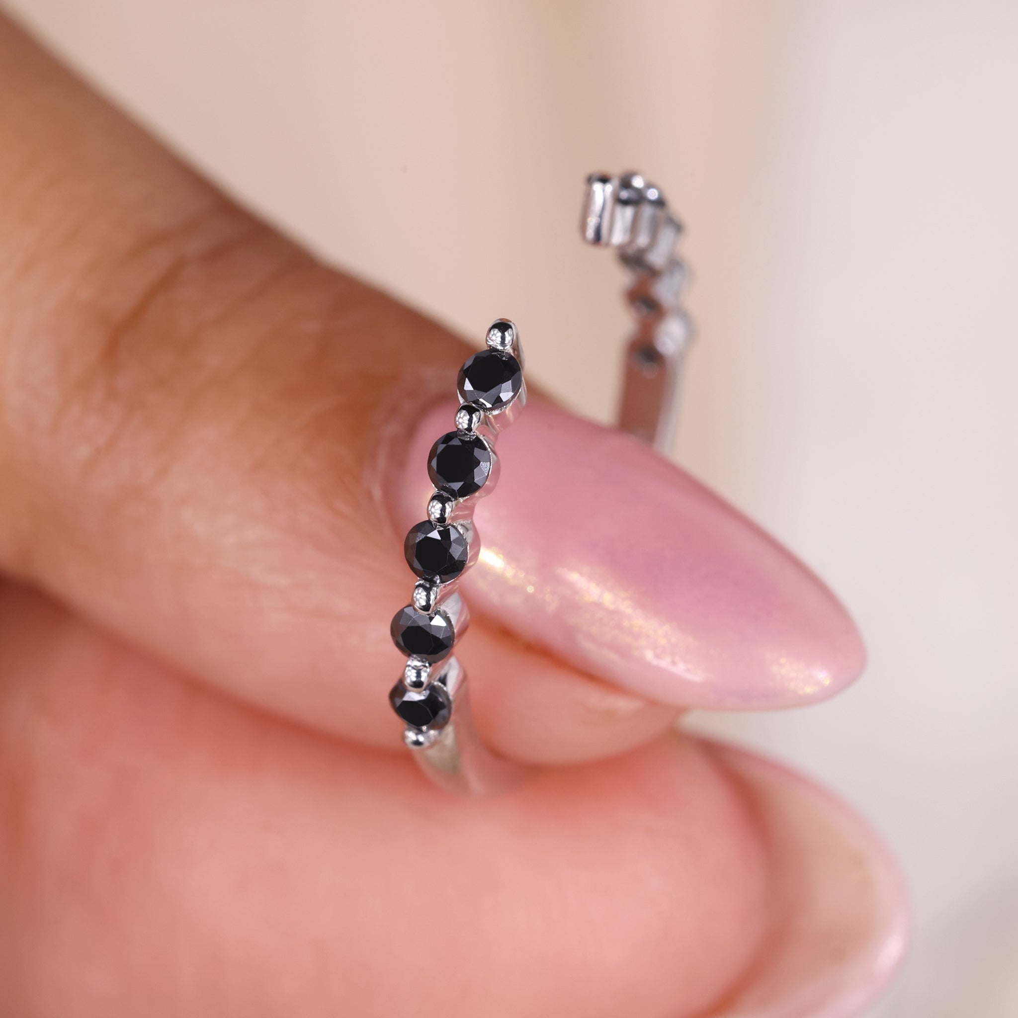 Half eternity band featuring a round cut wedding band for a timeless design.