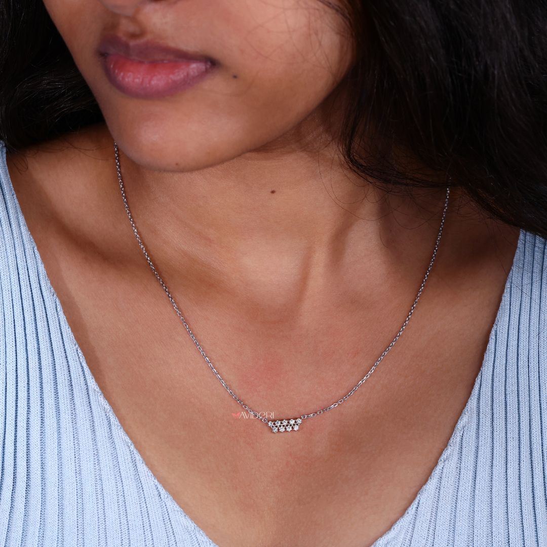 Handmade pendant featuring a horizontal bar layout