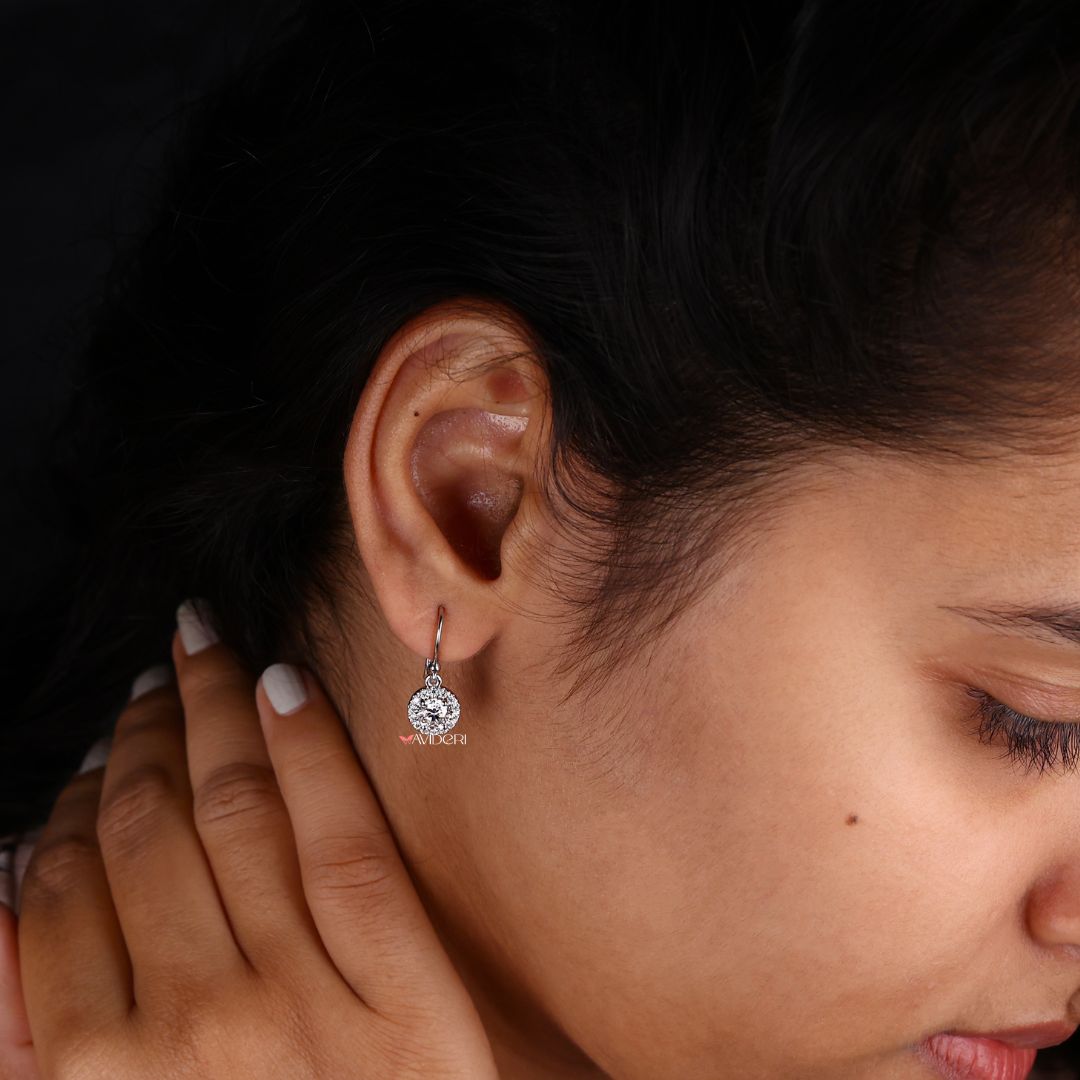 Wire hook earrings featuring round cut Moissanite for everyday wear.