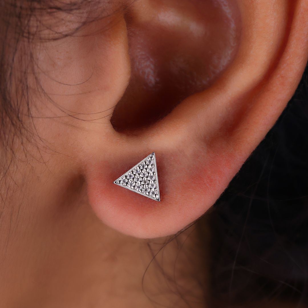 Triangle Shape Earrings featuring round cut stones in white gold.
