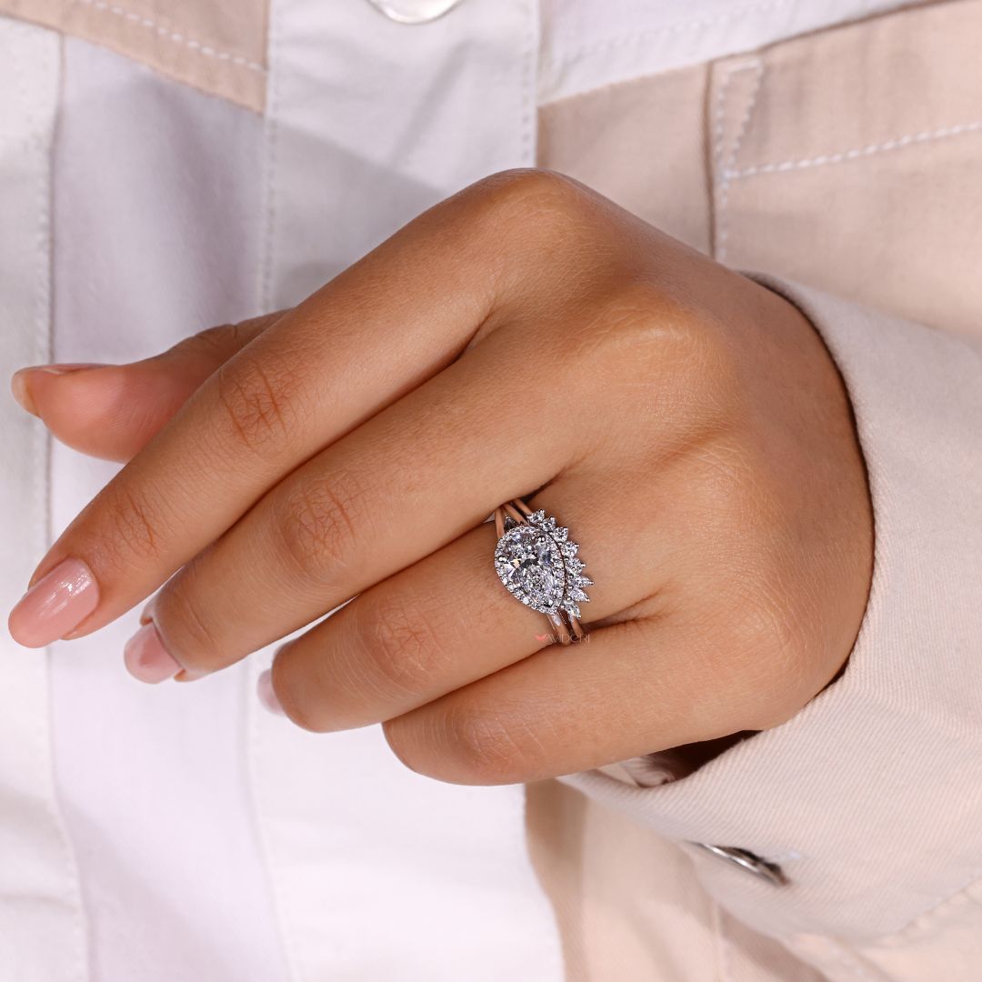 Pear Diamond Halo setting offers a graceful finish with captivating detail.