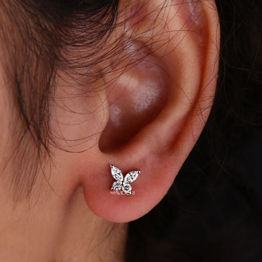 Marquise cut earrings with Moissanite butterfly stud earrings for a chic look.