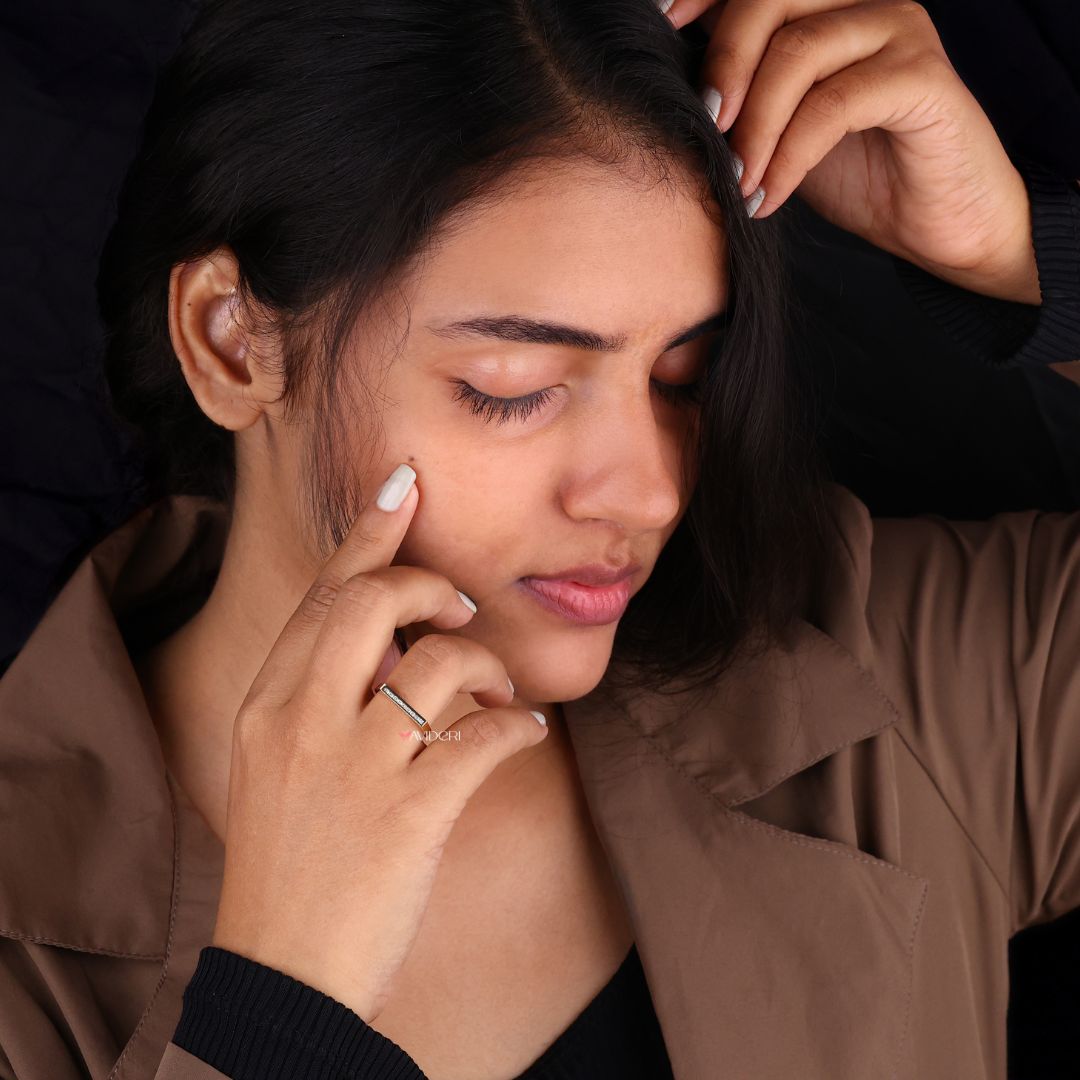 Round cut band delivers timeless elegance with smooth curves and brilliant sparkle.