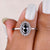 Oval cut moissanite ring featuring a stunning sparkle and unique design.
 Oval cut moissanite ring featuring a stunning sparkle and unique design.
