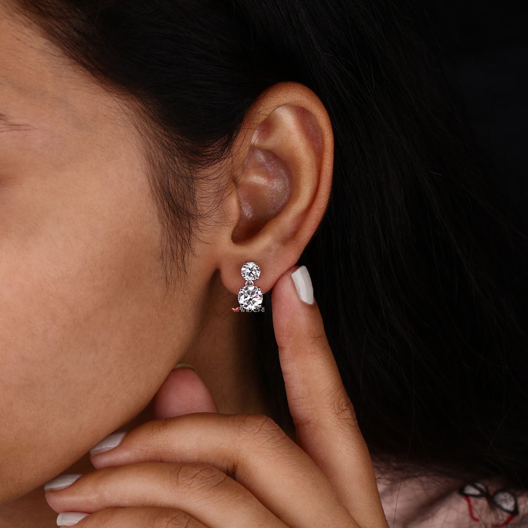 Round cut Moissanite earrings with push back earrings for everyday elegance.