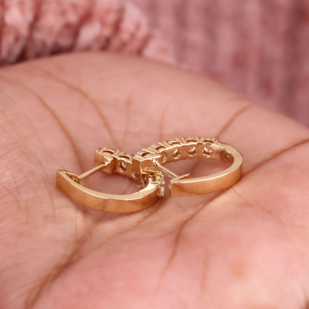 Handmade earrings in a yellow gold hoop style