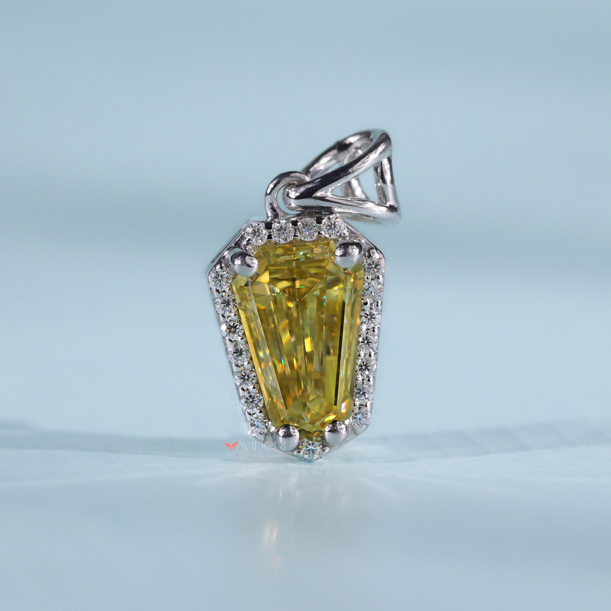 Halo Set pendant surrounds stones with elegant brilliance.