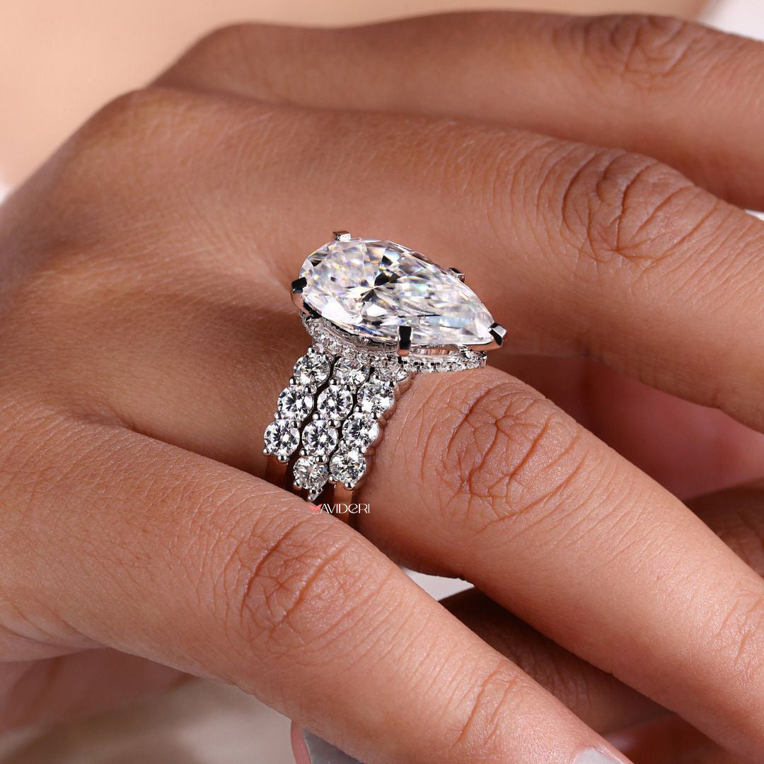 Round moissanite wedding band showcases brilliant moissanite stones.