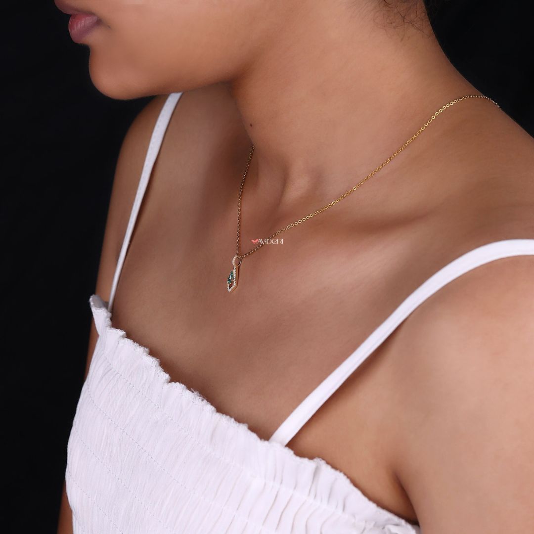 Handmade jewelry featuring a detailed halo pendant.