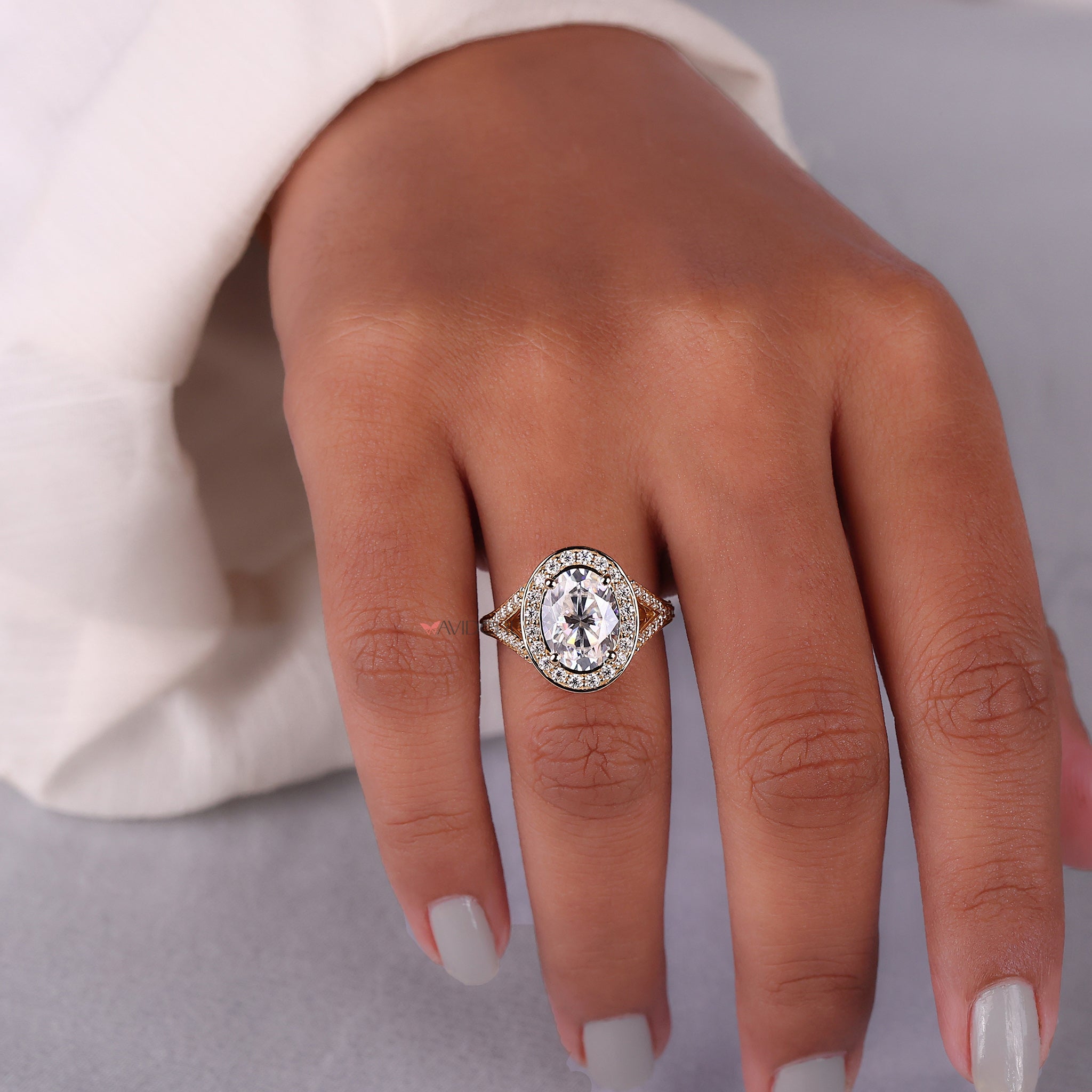 Halo style wedding ring with a sparkling halo of diamonds.