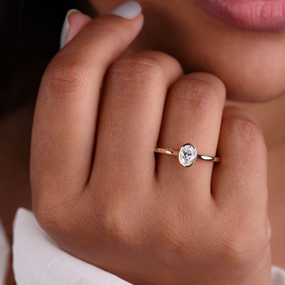 This yellow gold ring gleams with warm, radiant charm.